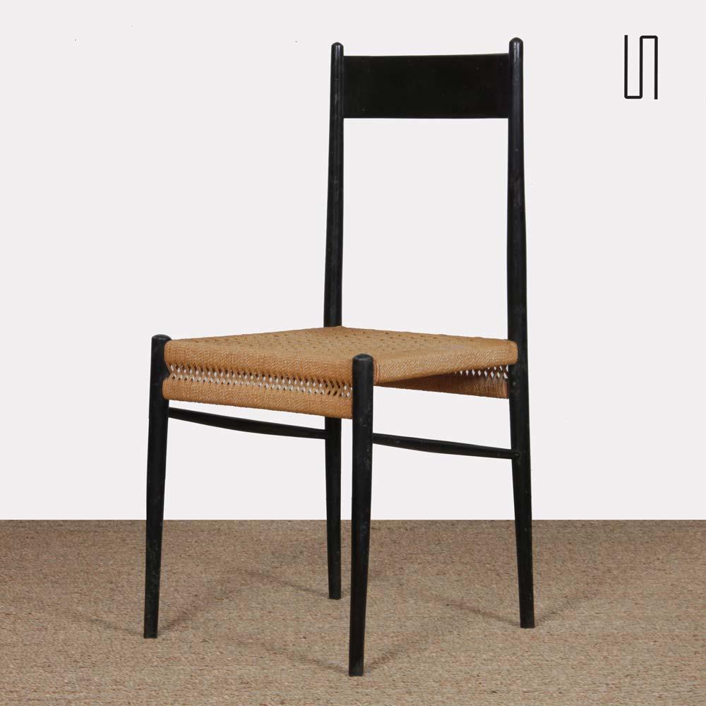 This chair was produced by Consorzio Sedie Friuli in the 1960s. The structure is in black-painted wood and the seat in rope. This Italian seat is in good vintage condition.