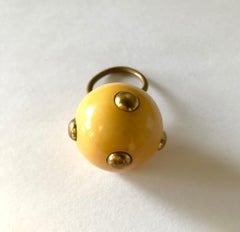 Vintage 1960s Kenneth Jay Lane Beige Bakelite Plastic Go Go Ring Brass Studs