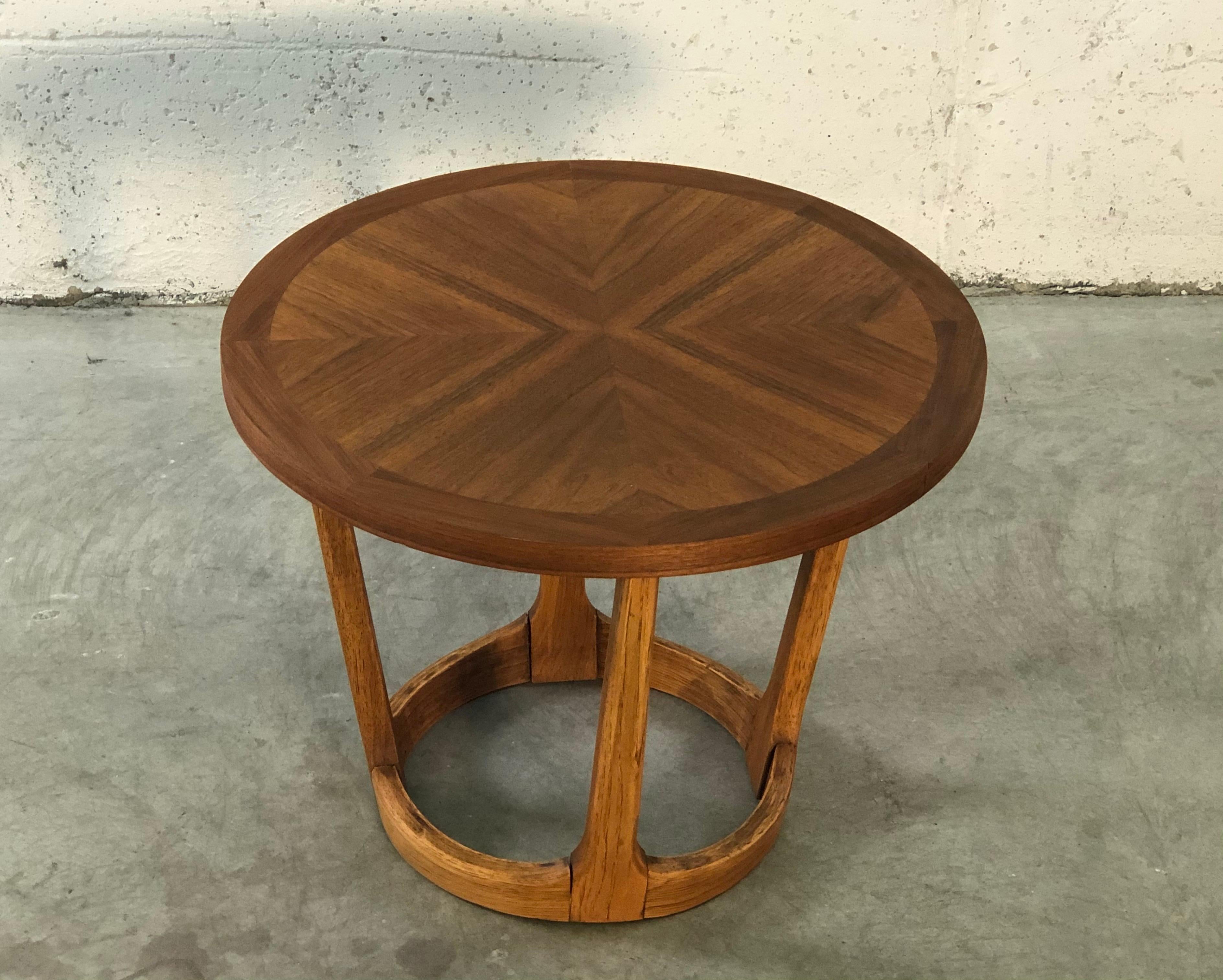 Vintage 1960s small round walnut wood side table by Lane Furniture Co. In refinished condition. Marked underneath.