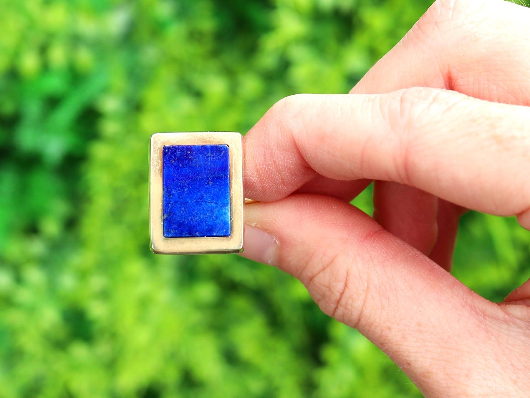 An impressive pair of vintage lapis lazuli and 14k yellow gold cufflinks; part of our diverse gemstone jewelry and estate jewelry collections.

These fine and impressive lapis lazuli cufflinks have been crafted in 14k yellow gold.

Each of the 14k