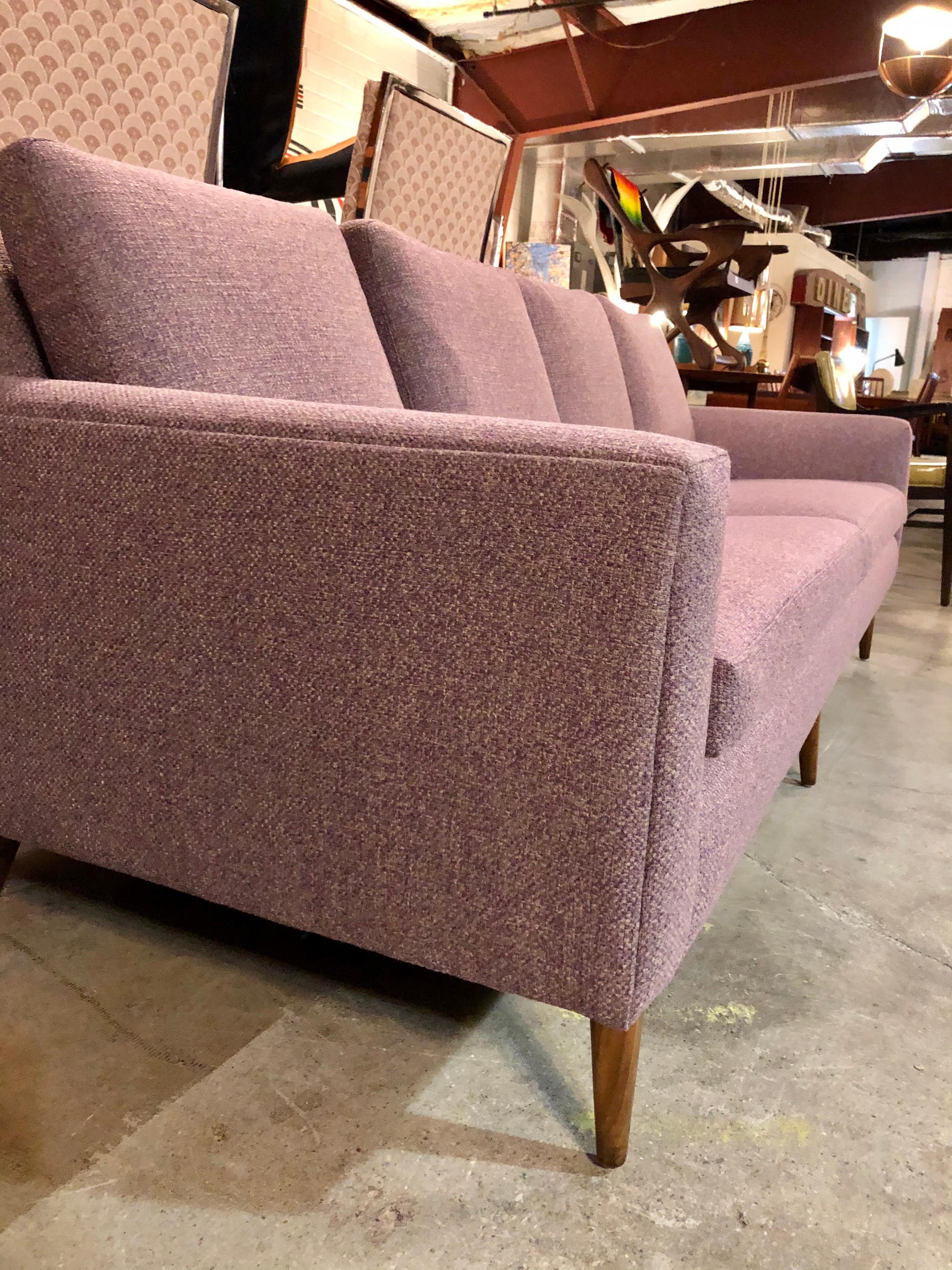 Designed by Paul McCobb for Directional, this sofa is in overall good condition. New lavender wool upholstery. 1960s. USA.
Dimensions:
29.5”H x 33” D x 85” W
17.5” seat height
24” arm height.