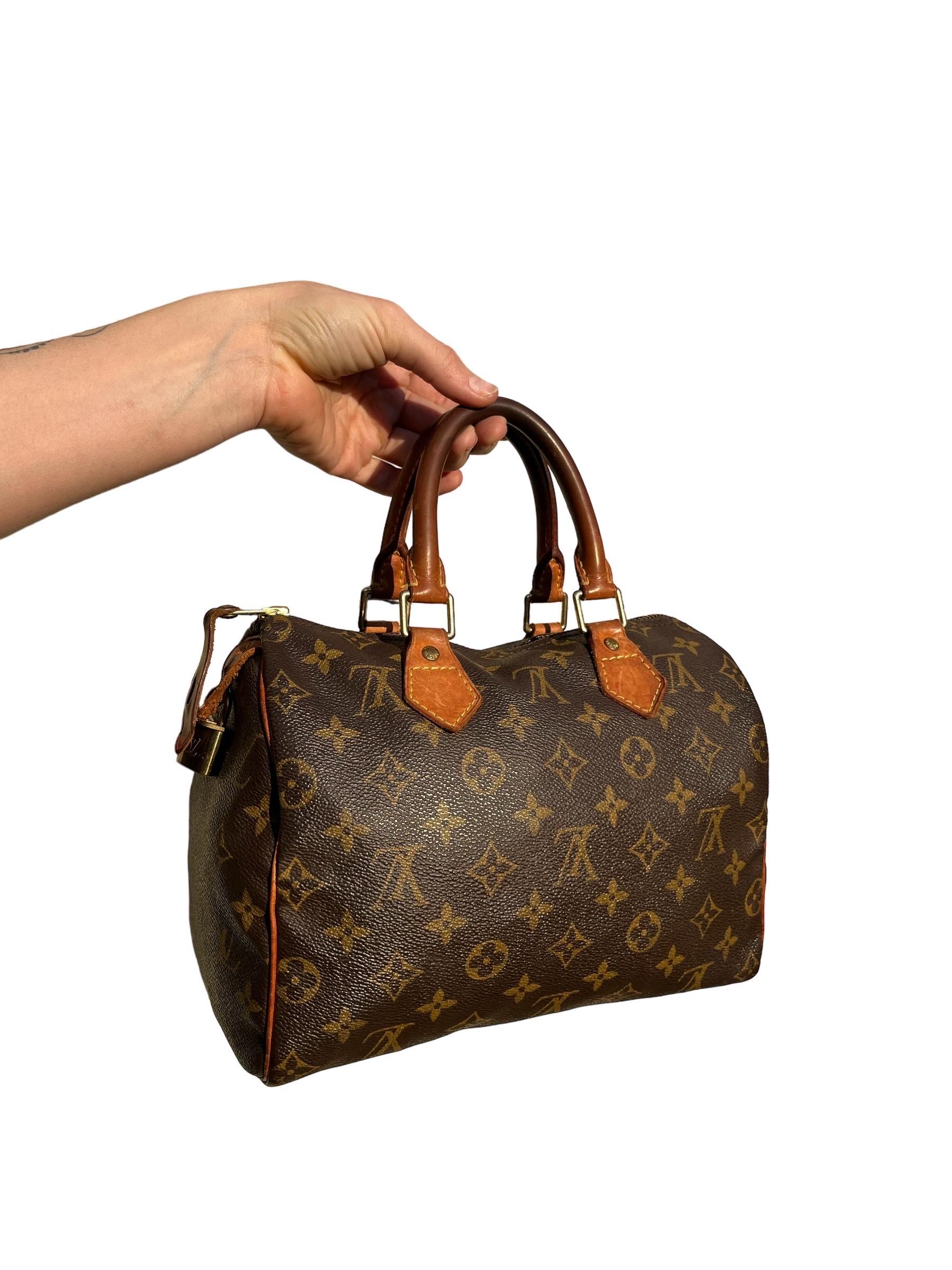 Classic Vintage 1960s Louis Vuitton Speedy 30 Handbag Monogram Canvas

Authenticated Louis Vuitton canvas bag from the 60's with lock and key. Leather handles, monogram printed canvas body, metal hardware. 
Excellent condition! See photos & videos