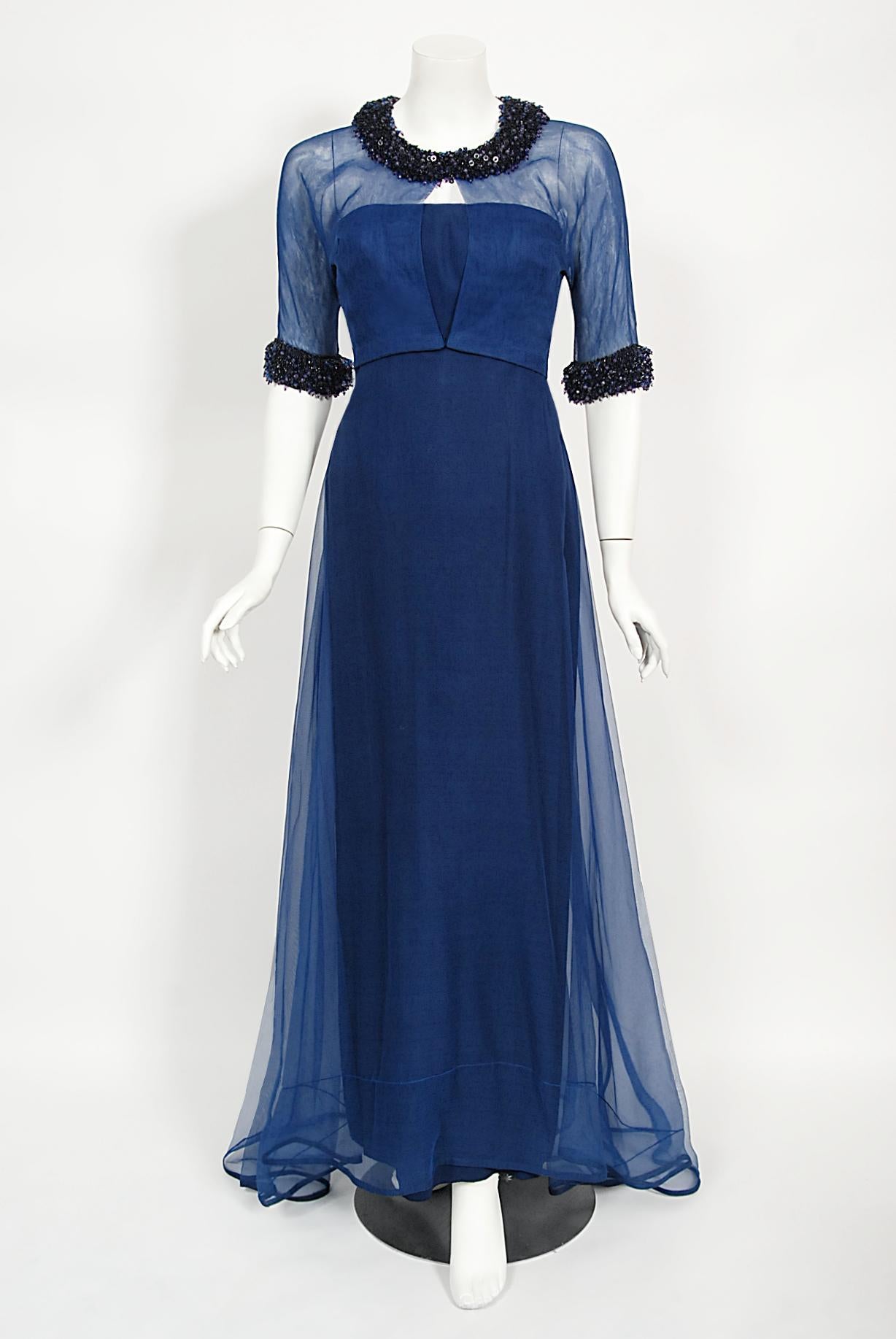An unforgettable and incredibly rare Madame Grès haute couture vibrant cobalt-blue sheer silk three piece gown ensemble dating back to the mid 1960's. This dramatic look was custom commissioned by Contessa Marina Cicogna, a famous Italian film