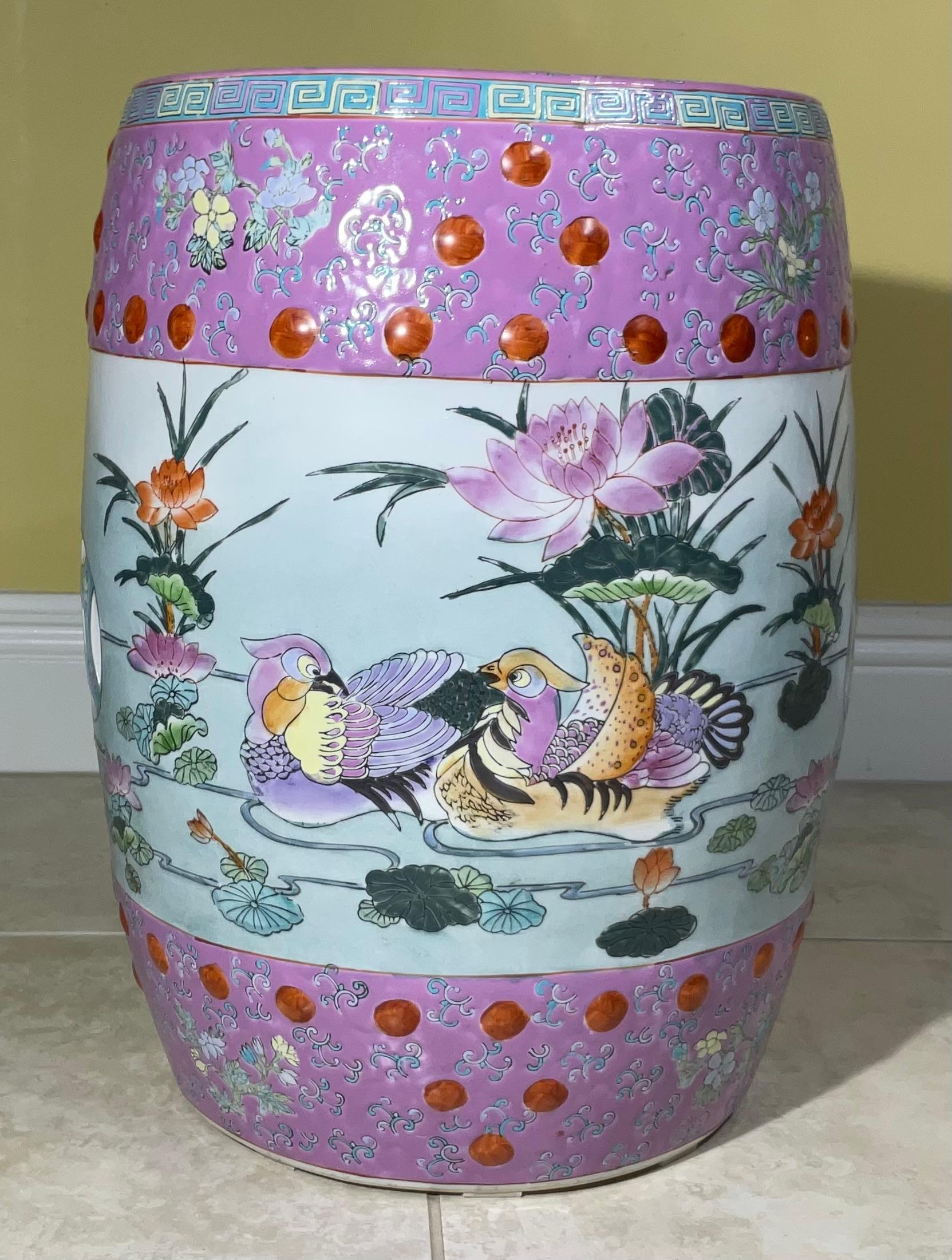 

Bring a splash of vibrant color and timeless artistry to your home or garden with this breathtaking vintage Chinese Famille Rose ceramic garden stool. Originating from the mid-century era, likely the 1960s, this piece embodies the exquisite
