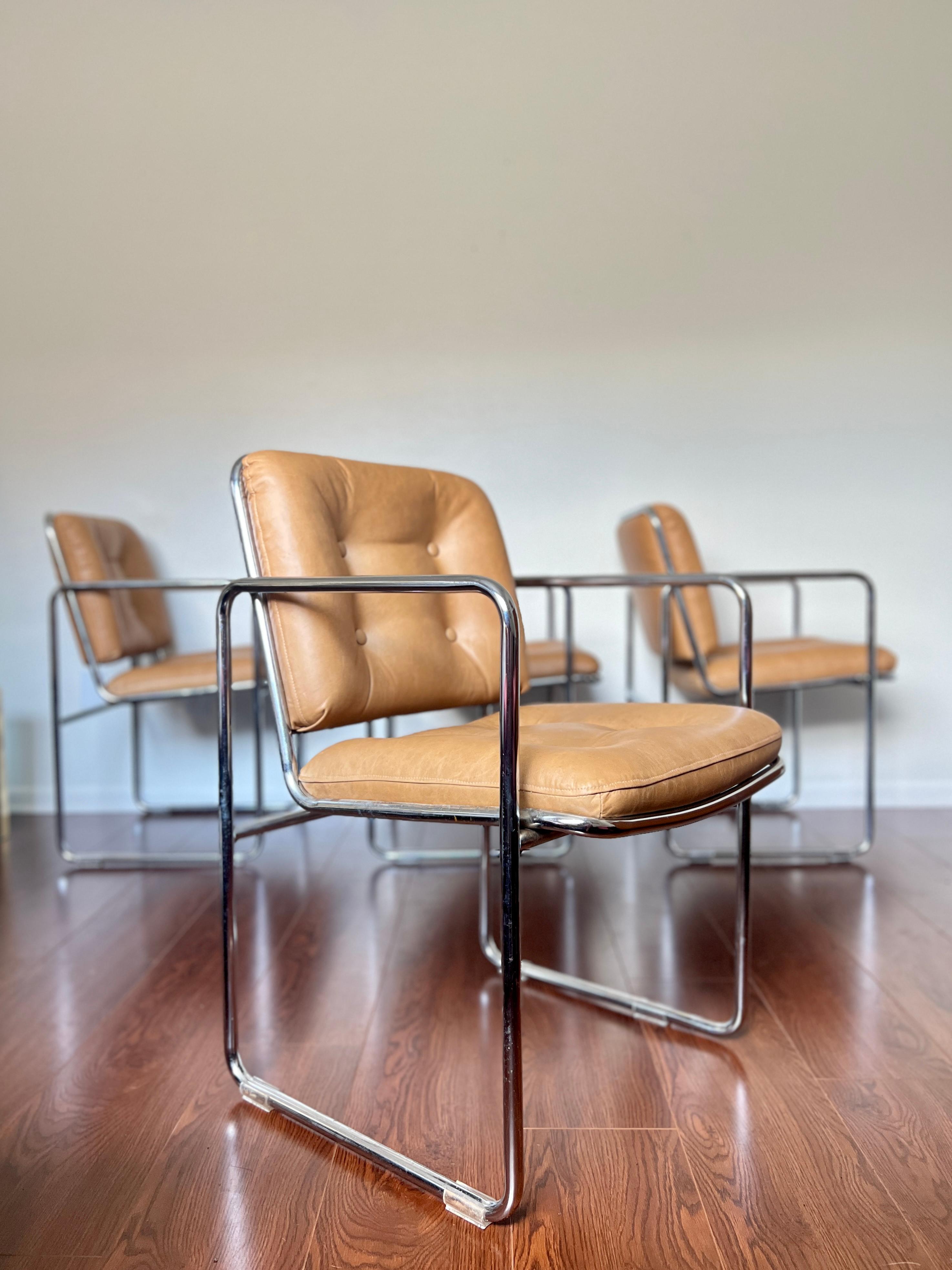 Vintage 1960s Mid-Century Modern chrome tubular chairs by Chromcast. Newly reupholstered in a buttery high quality cowhide leather in a saddle tan brown color. Overall, In excellent condition. 

Leather specs:
-Type: Distressed Top Grain
-