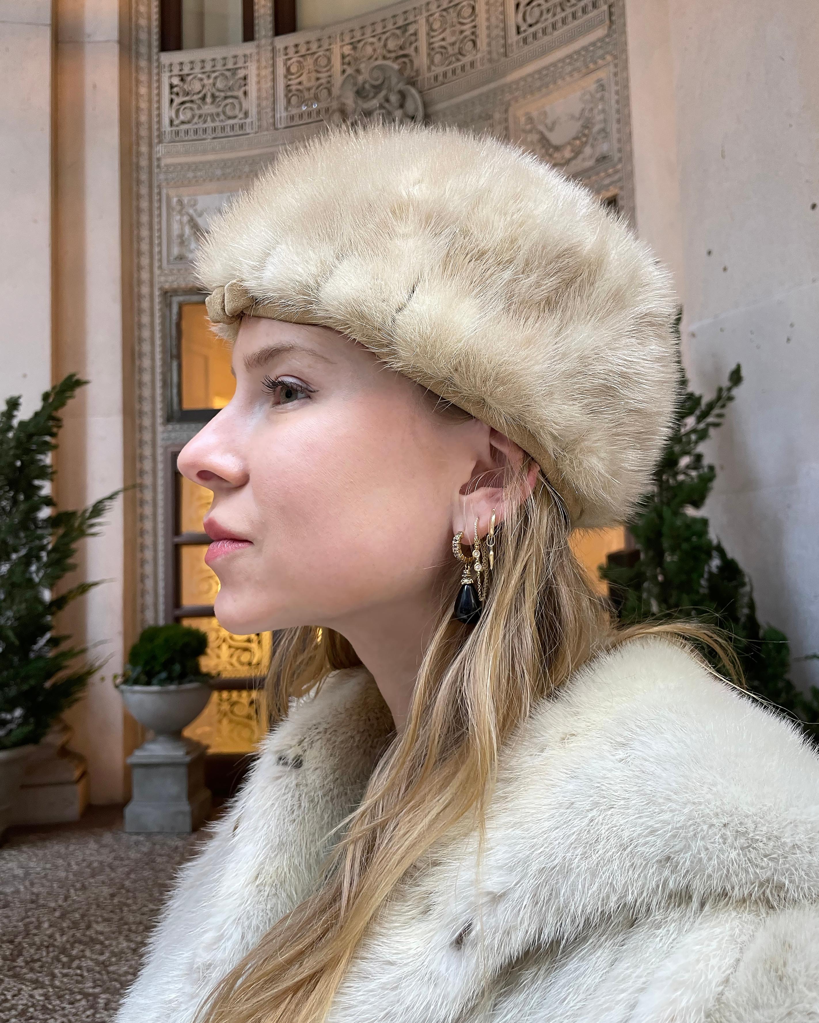 Vintage 1960s Mink Pillbox Hat: This mink fur hat is so sweet— it feels straight out of a look Catherine Deneuve would have worn in the 1960s. The blonde mink is so incredibly soft. It was made in the 1960s by famed New York milliner Betmar. It's