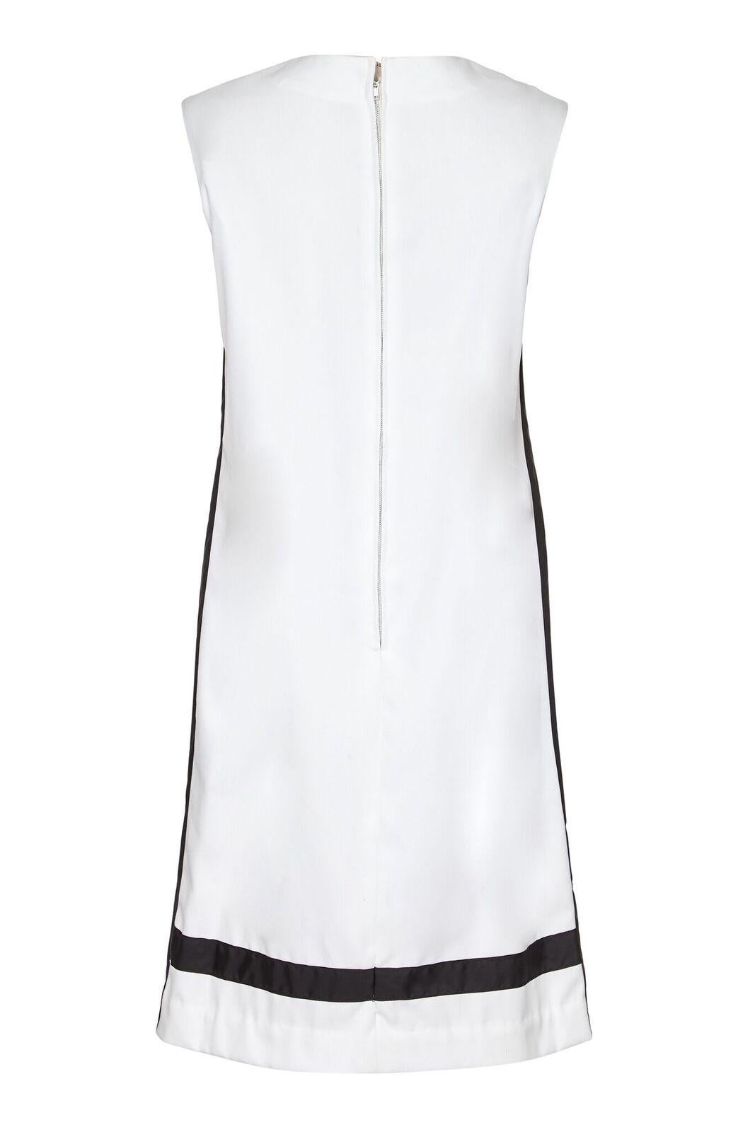 This arresting vintage 1960s shift dress with a Mondrian inspired design is a copy of the much coveted Yves Saint Laurent piece from the designer's A/W collection 1965-66 . Comprised of rich cotton fabric in block primary colours juxtaposed with
