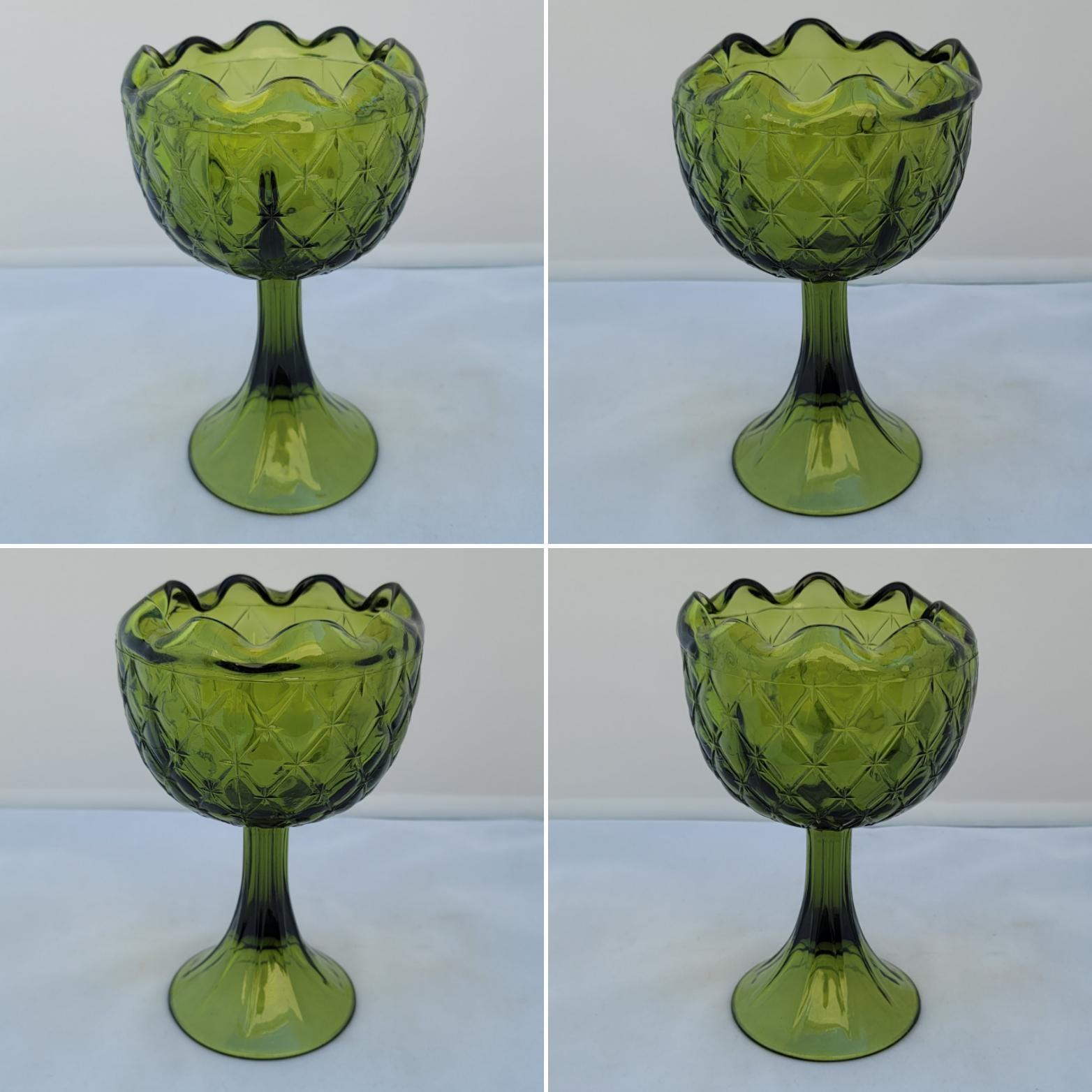 This gorgeous gothic or renaissance revival large decorative glass goblet has beautiful hand-made details and an overall shape and aesthetic that will be a welcome addition to any table top. Vibrant olive green tops of the beauty of this piece and