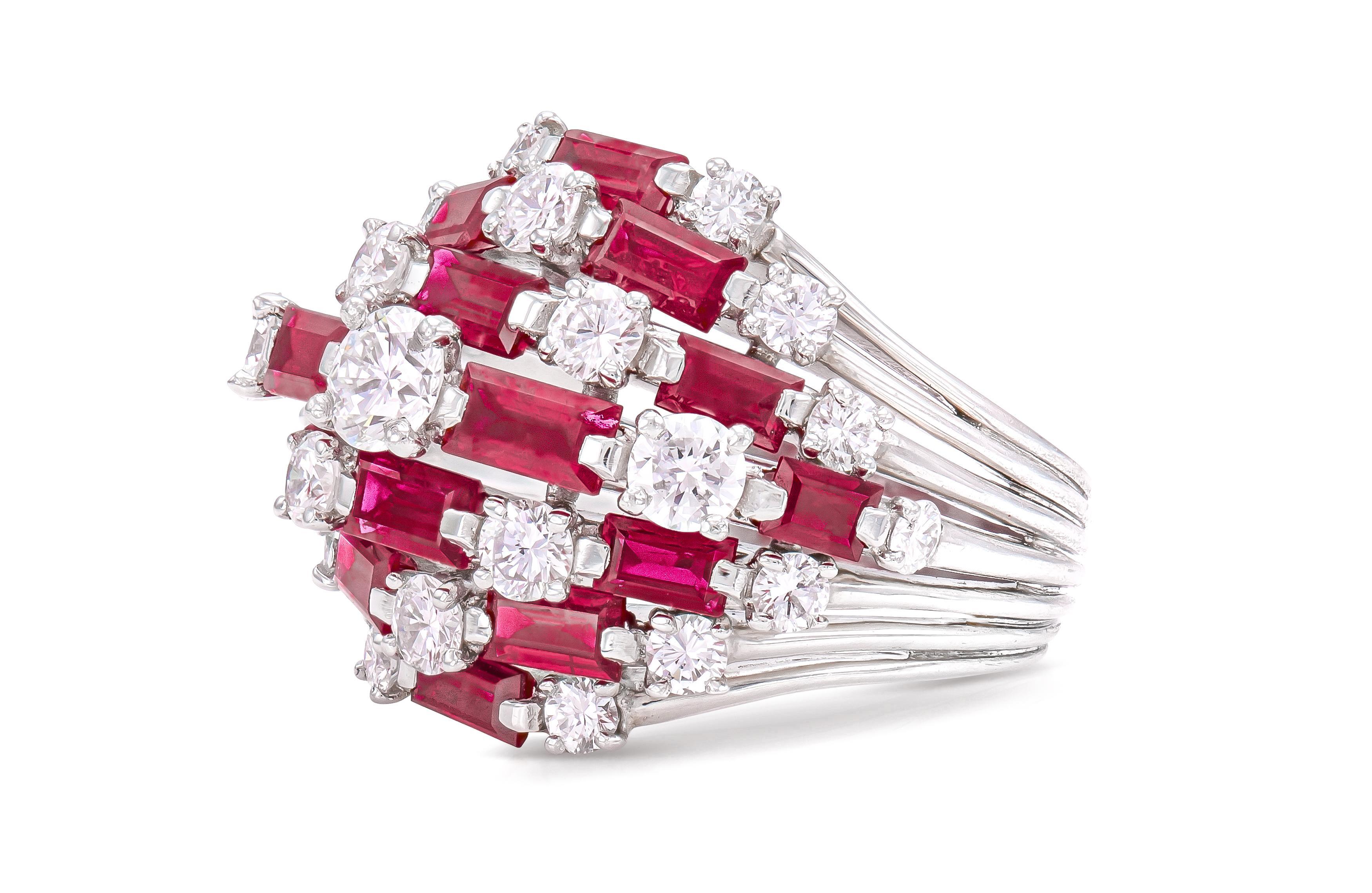 Finely crafted in platinum with Baguette cut Rubies weighing a total of 4.57 carats, and Round Brilliant cut Diamonds weighing a total of 2.22 carats.
Numbered by Oscar Heyman
Circa 1960s
Size 6 1/2
Comes with its original Certificate of