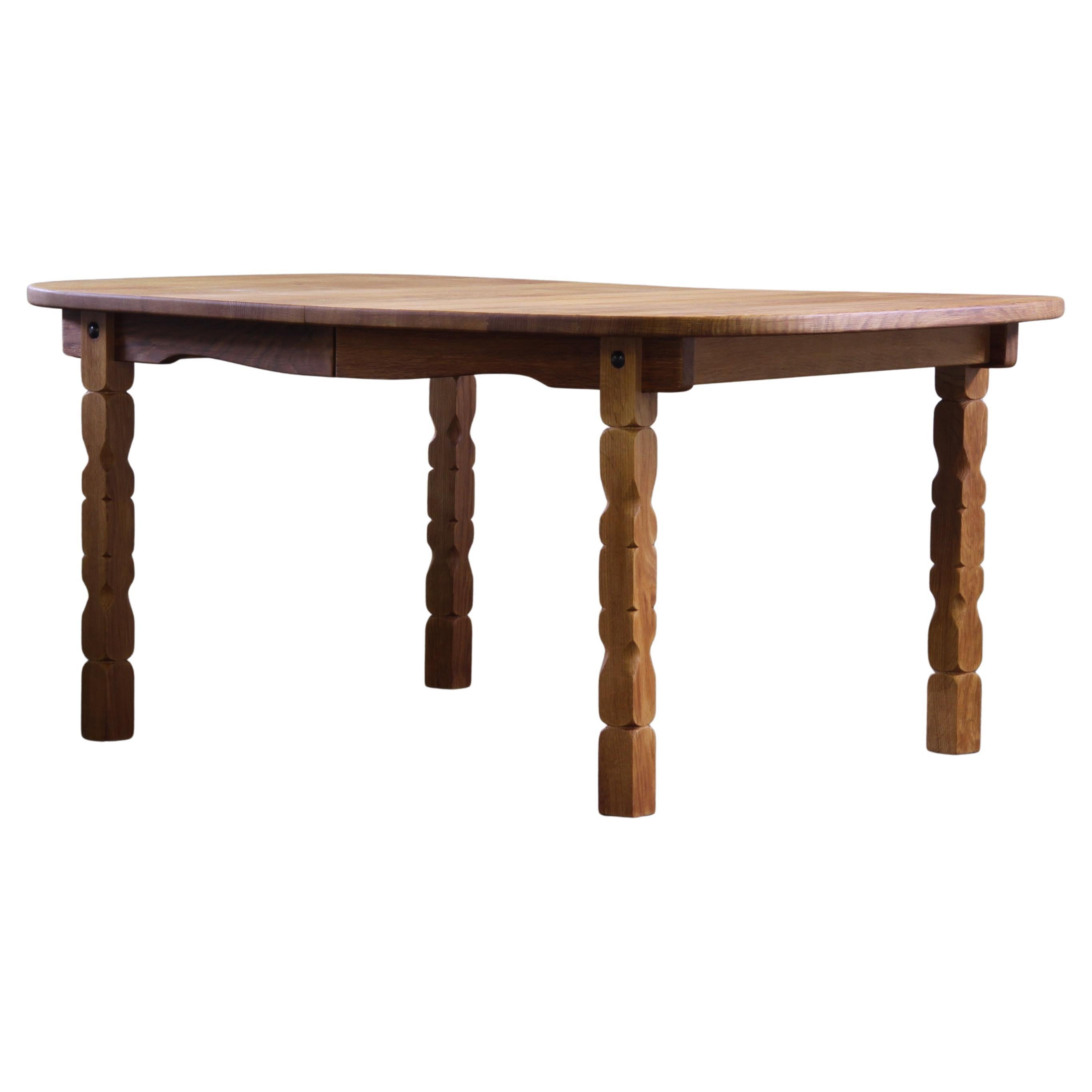 Vintage 1960s Oval Brutalist Danish Extending Oak Dining Table Style of Kjærnulf For Sale