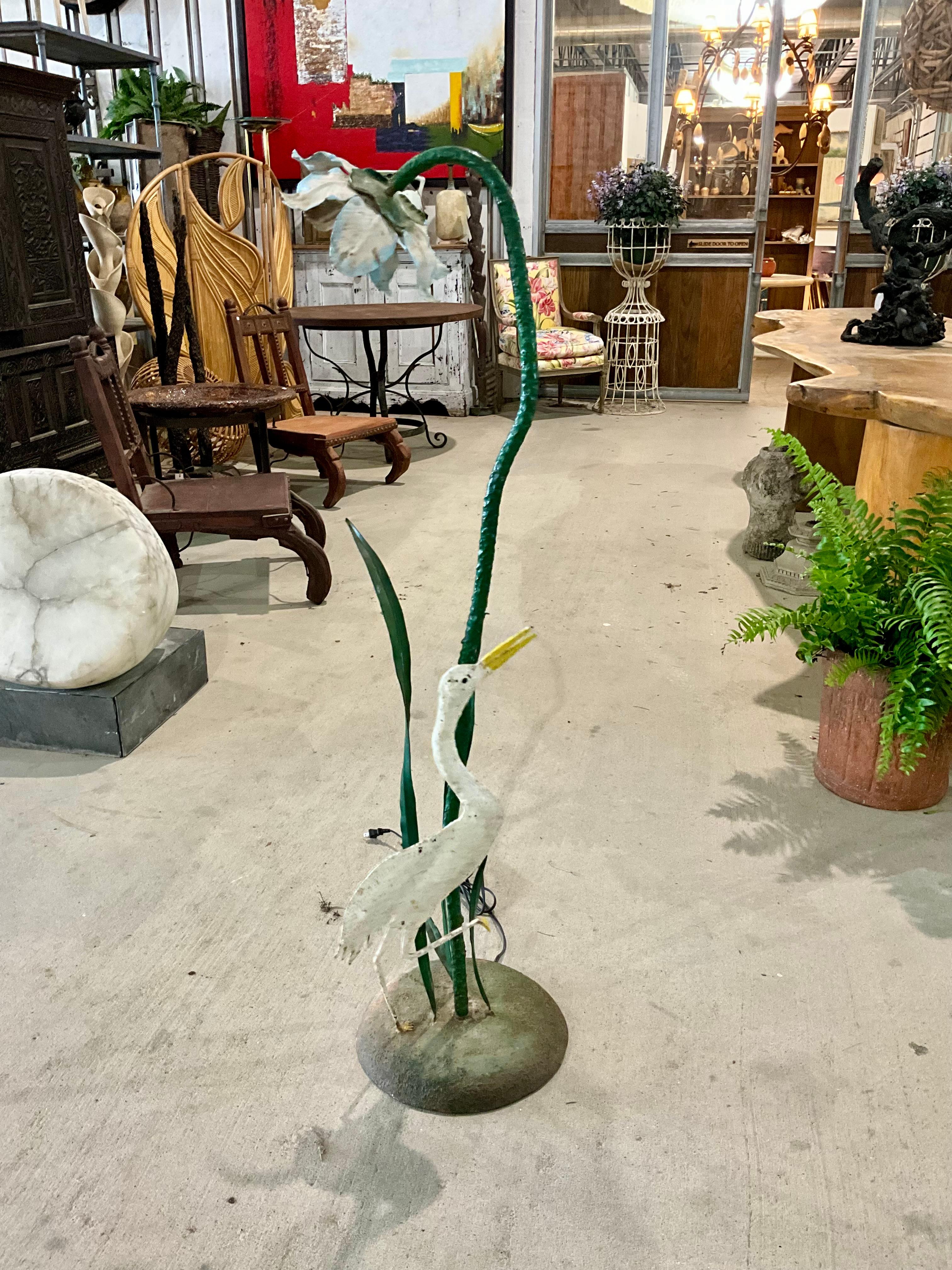Vintage 1960s Painted Iron Lamp with Bird and Flower Design

This charming vintage lamp stands at 51 inches tall and features a beautifully crafted flower at the top, painted in soft hues. The lamp's design incorporates a graceful bird, likely a
