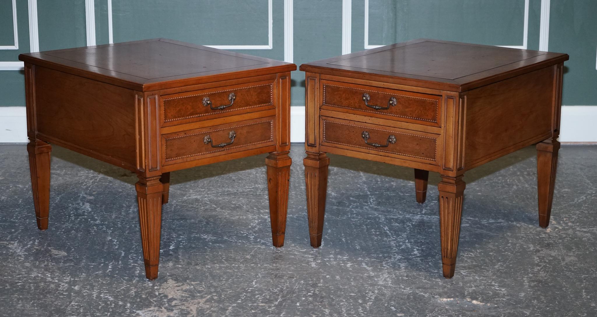 We are delighted to Present This Pair Of Walnut Bedside Tables.

They are made by Hammary which is an American-based company.
The front drawers have this beautiful burr on the wood, with original handles to open all drawers.
Also, the legs are