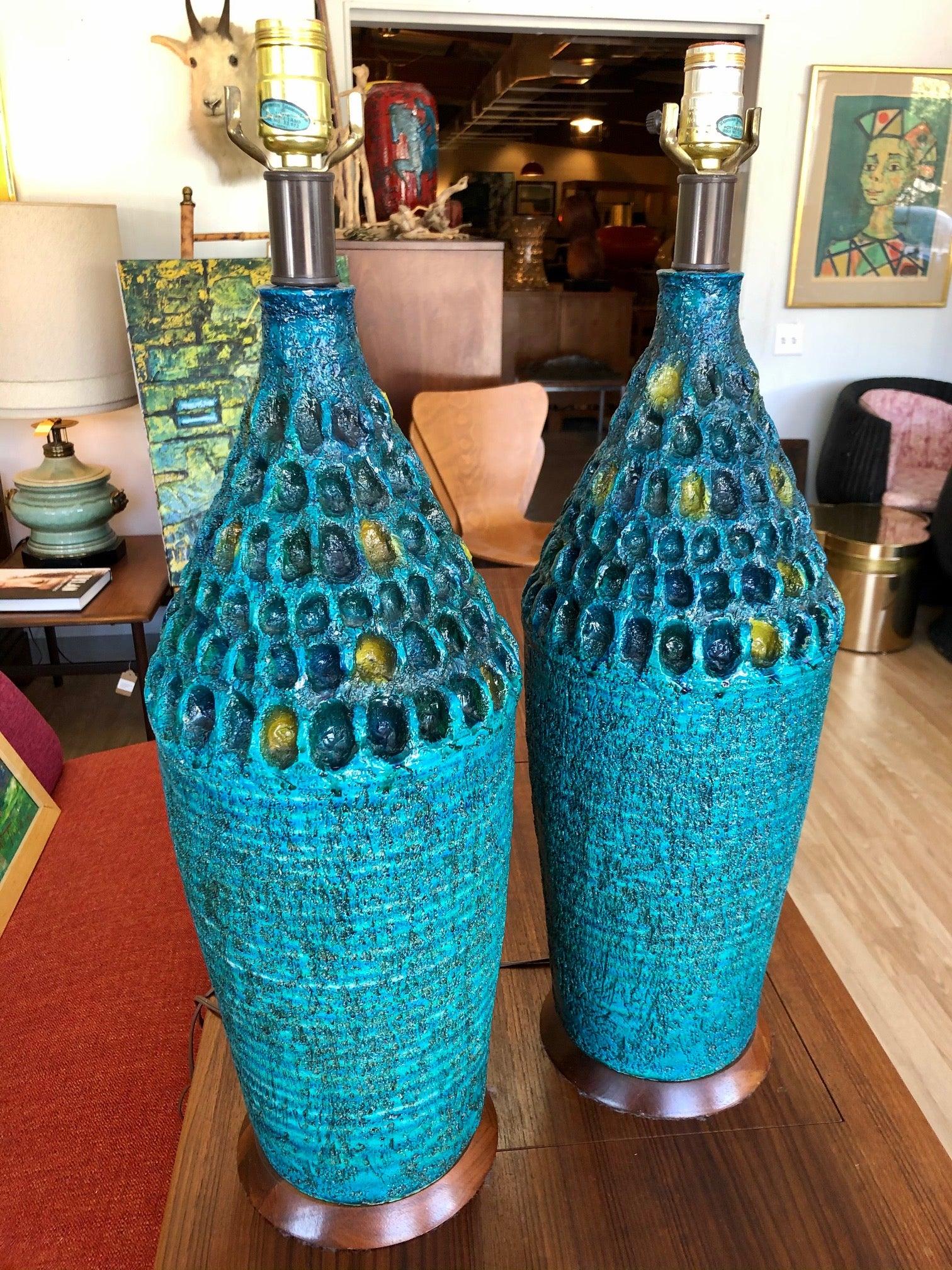 Lamps are in overall good condition. Glazed. Varied hues of blue and splash of yellow-green. Hand-crafted texture. Walnut base.
Unknown artist or maker,
circa 1960s.
Dimensions:
27
