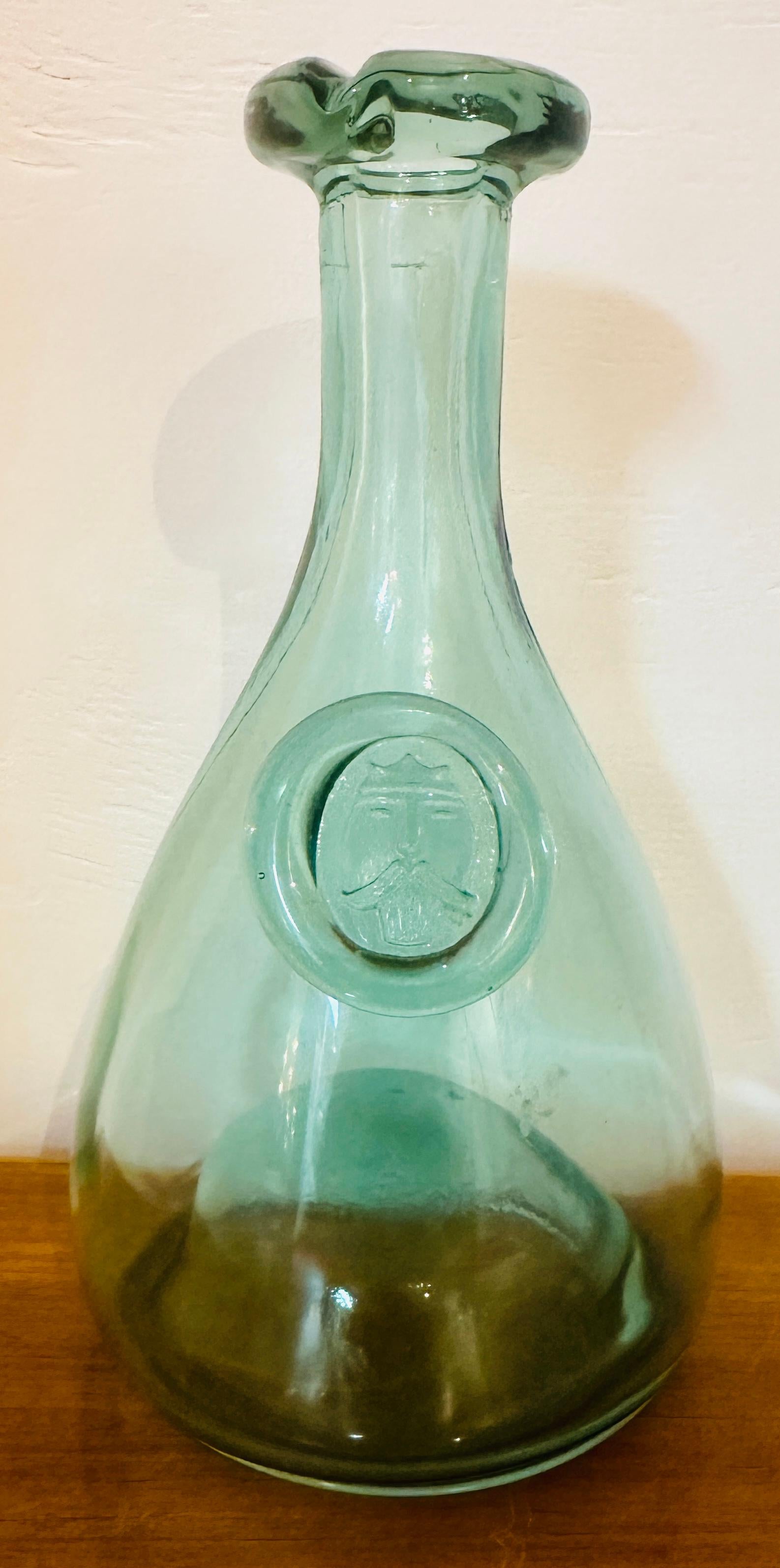 A wonderful pale green carafe, flask or decanter from Danish glassmaker - Holmegaard Glasværk's 