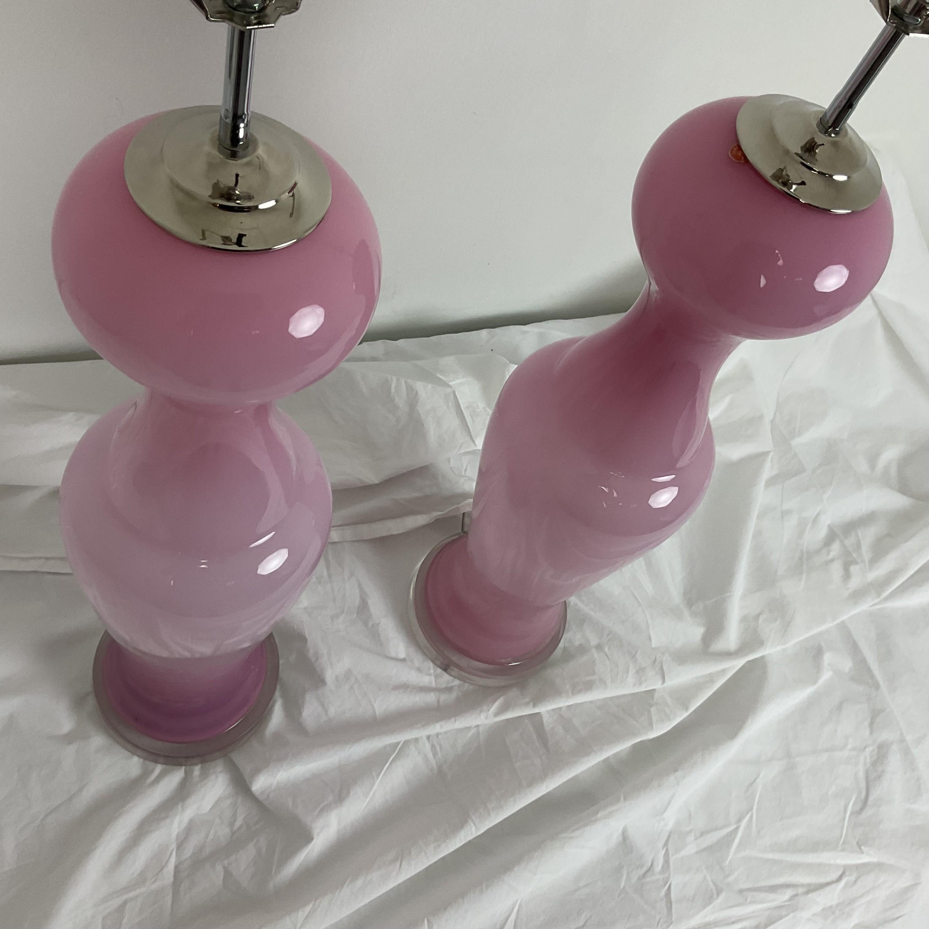 Beautiful Hand Blown Pink Murano Glass Mid-Century Lamp pair. Mint condition with Lucite Bases and nickel-plated hardware. Comes with two lucite finials.