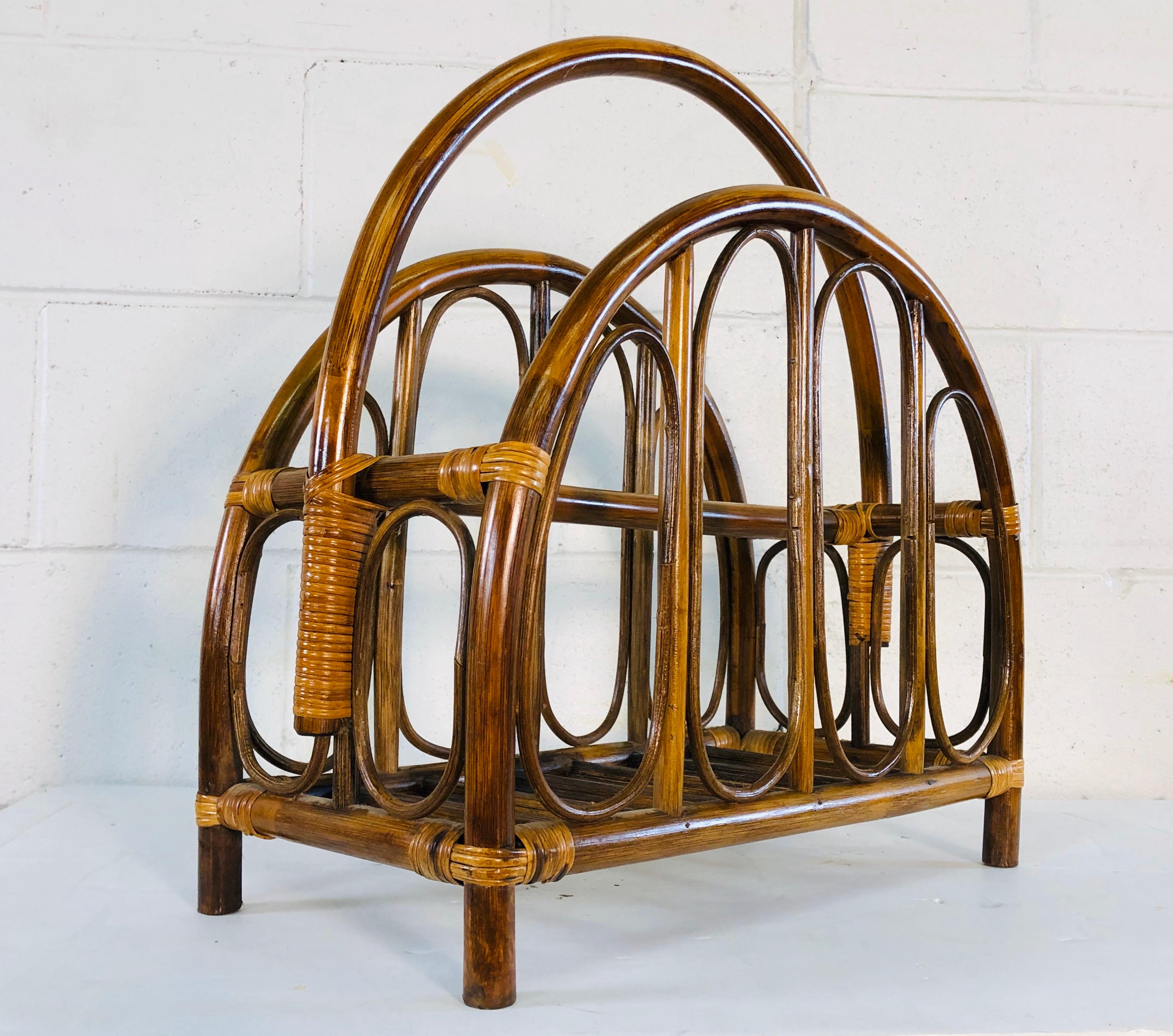Vintage 1960s rattan magazine rack with arch design. Excellent condition. No marks.