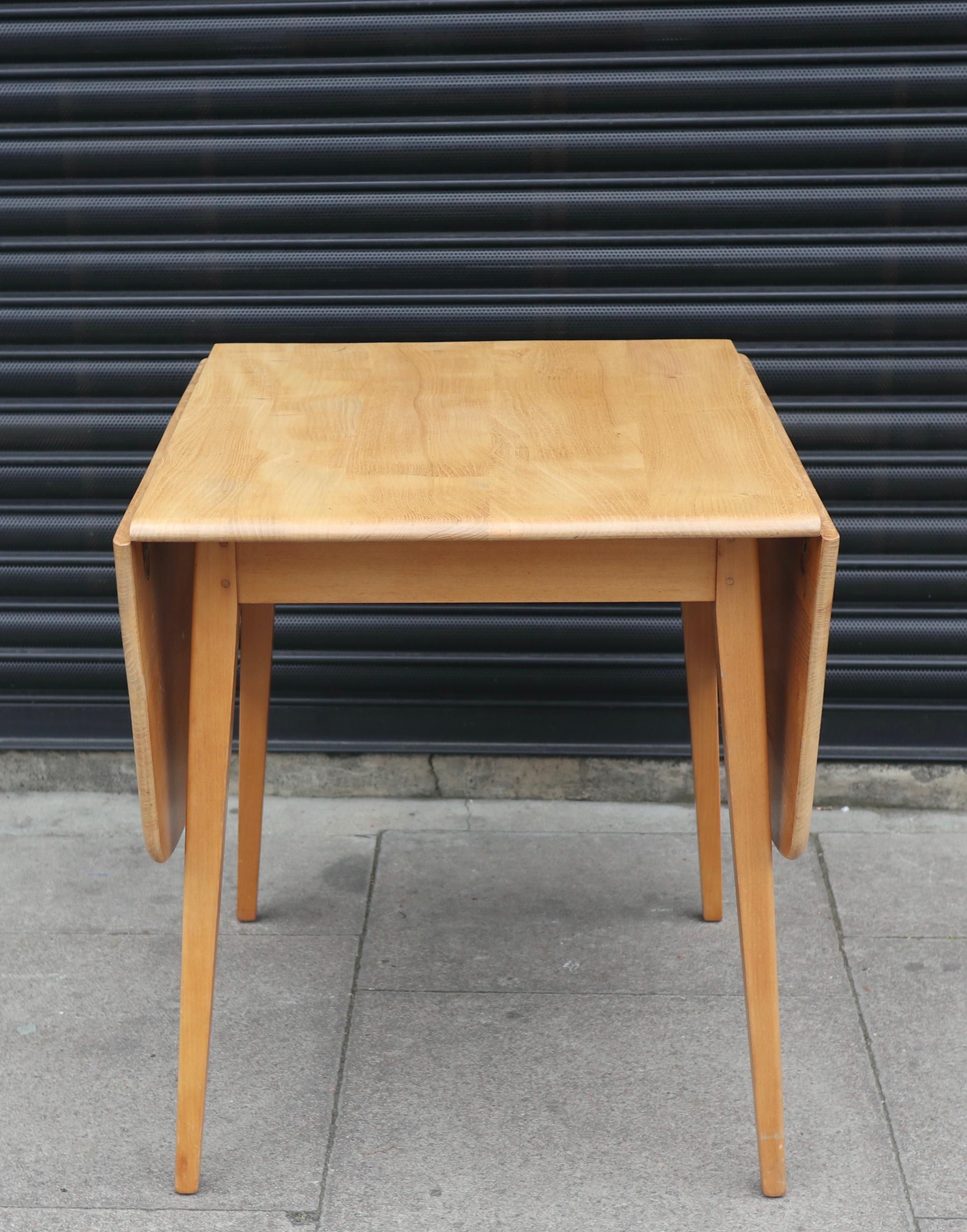 Vintage 1960s rectangle  Ercol drop leaf Elmwood and Beech dining table In Good Condition For Sale In London, GB