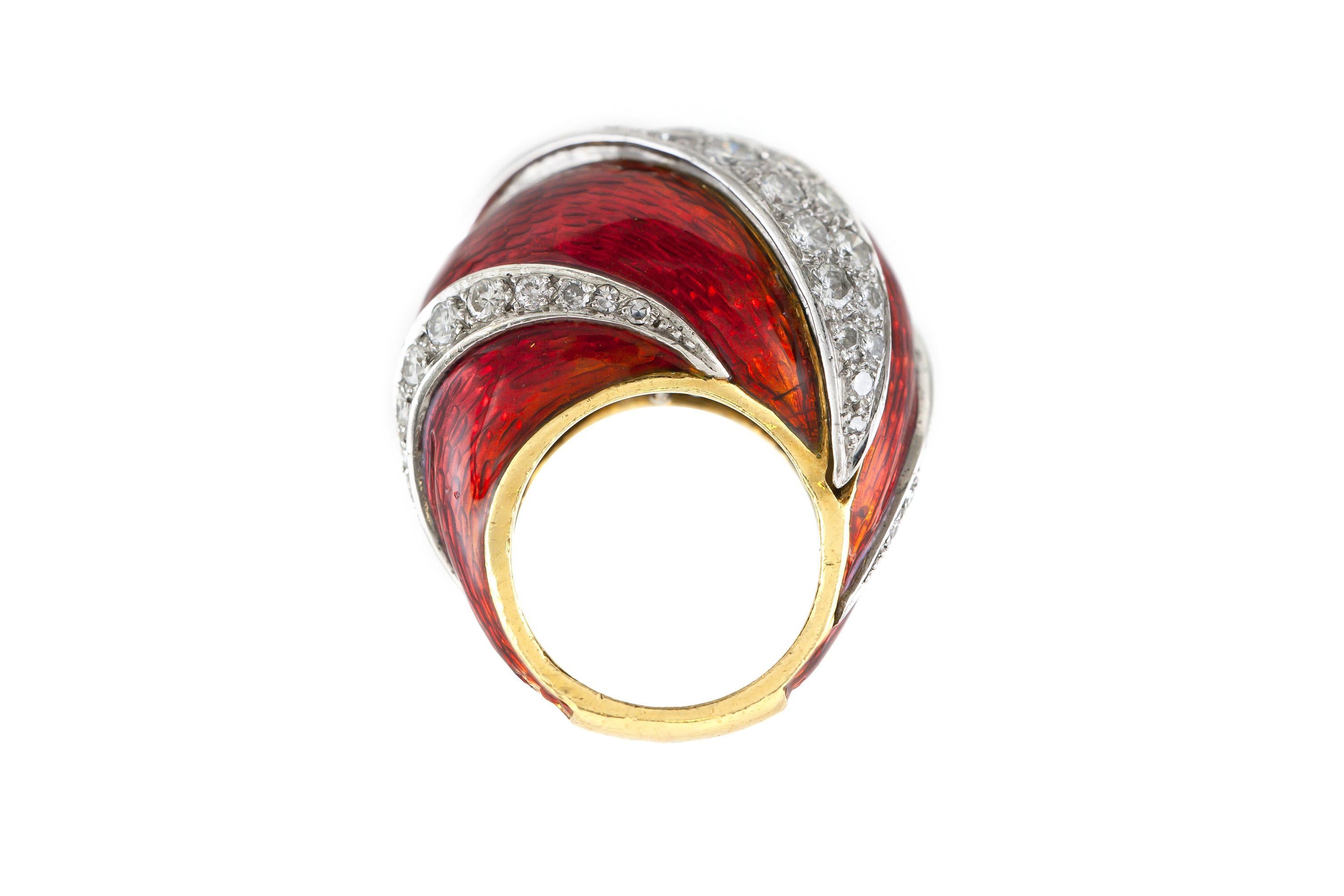 Finely crafted in 18k yellow gold, platinum and red enamel with Round Brilliant cut Diamonds weighing a total of approximately 4.50 carats, G-H color, VS1-VS2 clarity.
Circa 1960s
Size 7