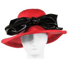 Chapeau Derby vintage en paille noire avec nœud rouge, années 1960 