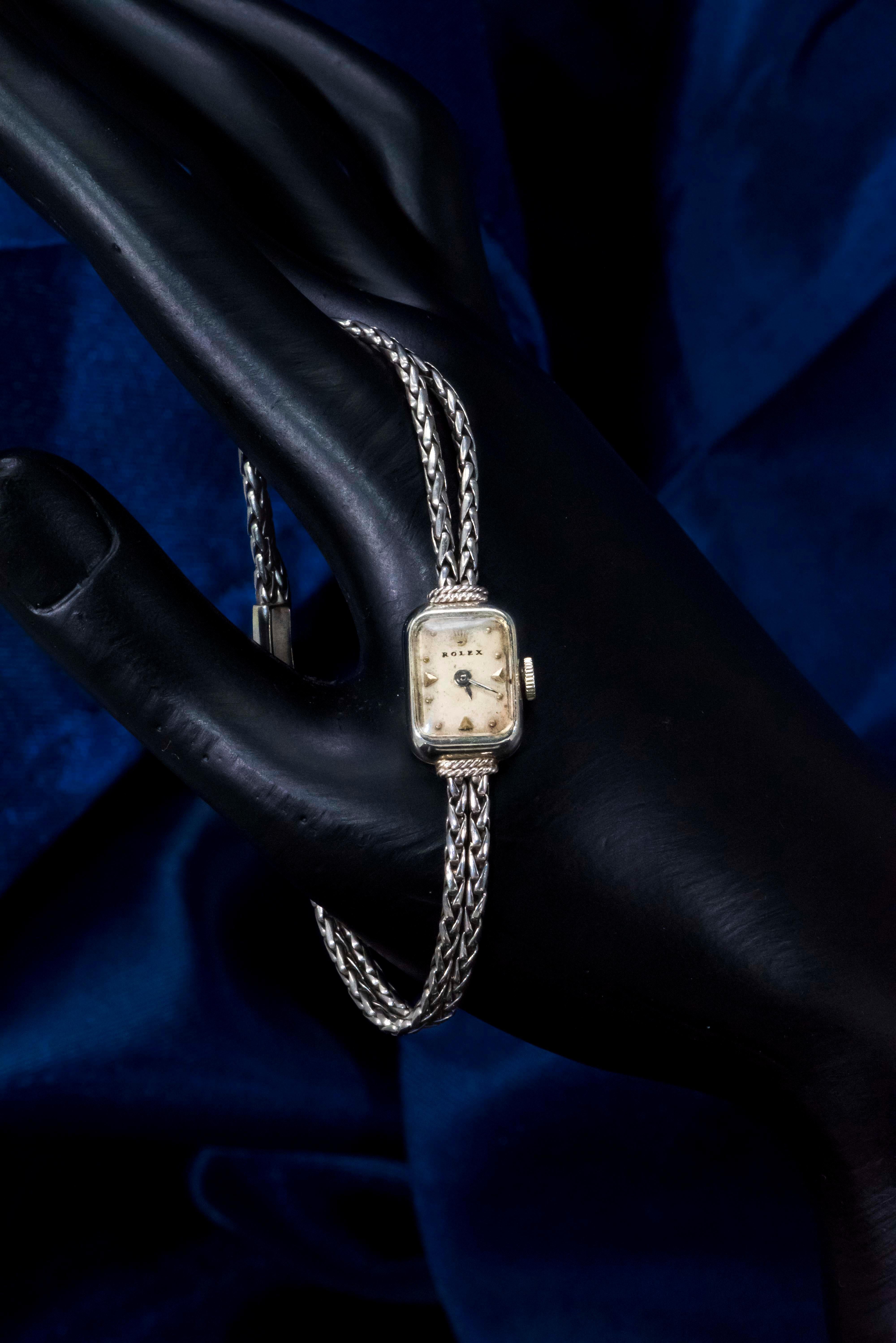 Wrist size fits up to 180mm * Can be resized complimentary as necessary
Case Dimenions are : 12mm X 14mm
Fully Signed on Dial, Case, Movement, Clasp & Hallmarked 

The present timepiece is a very interesting and well made 1950-1960s Vintage Rolex,