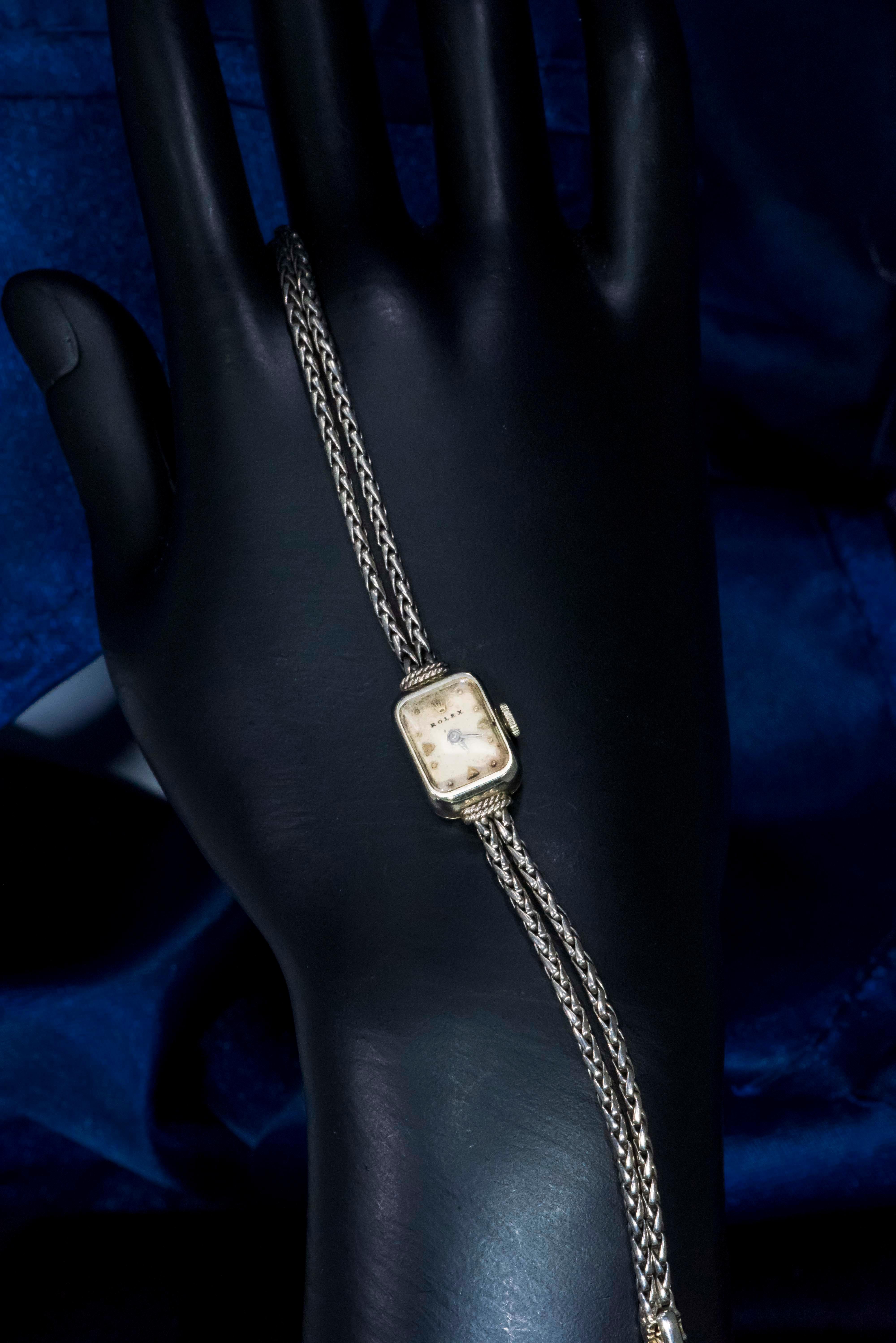 Vintage 1960s Rolex 18 Karat Gold Double Rope and Knot Motif Bracelet Watch In Fair Condition In New york, NY
