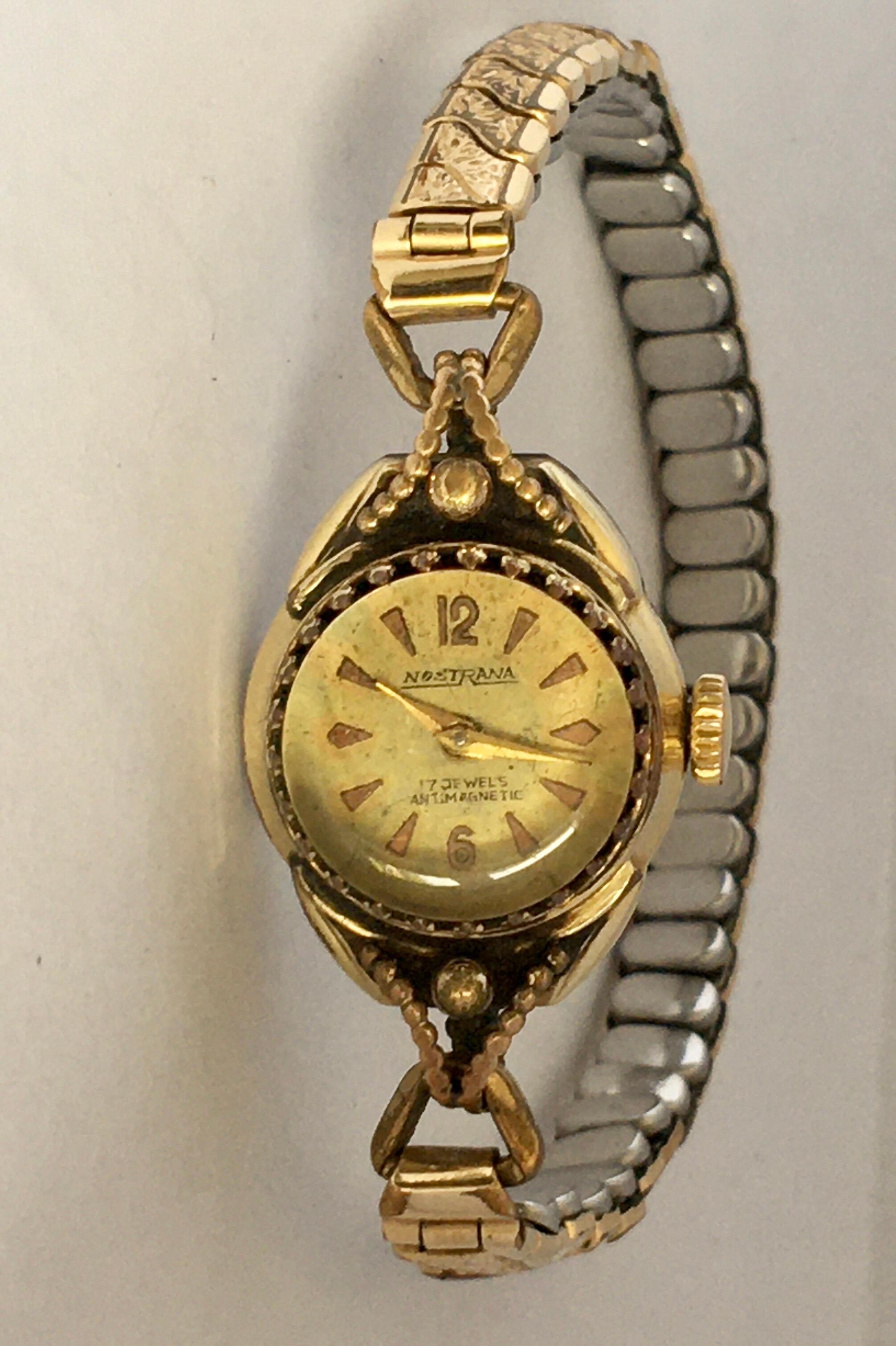 This beautiful and small pre-owned vintage ladies hand-winding watch is in good working  condition and it is ticking nicely. Visible signs of ageing and wear with small scratches on the glass and on the watch case. The Flexible 6.5 inches rolled