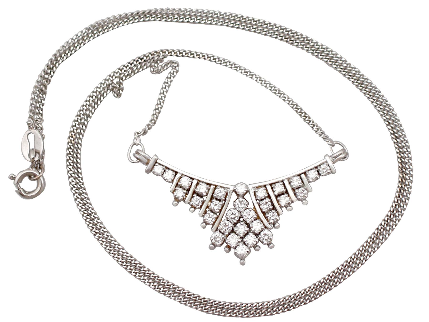 A fine and impressive vintage Russian 1.02 carat diamond and 18 karat white gold necklace; part of our diverse vintage jewelry and estate jewelry collections.

This fine and impressive vintage diamond necklace has been crafted in 18k white