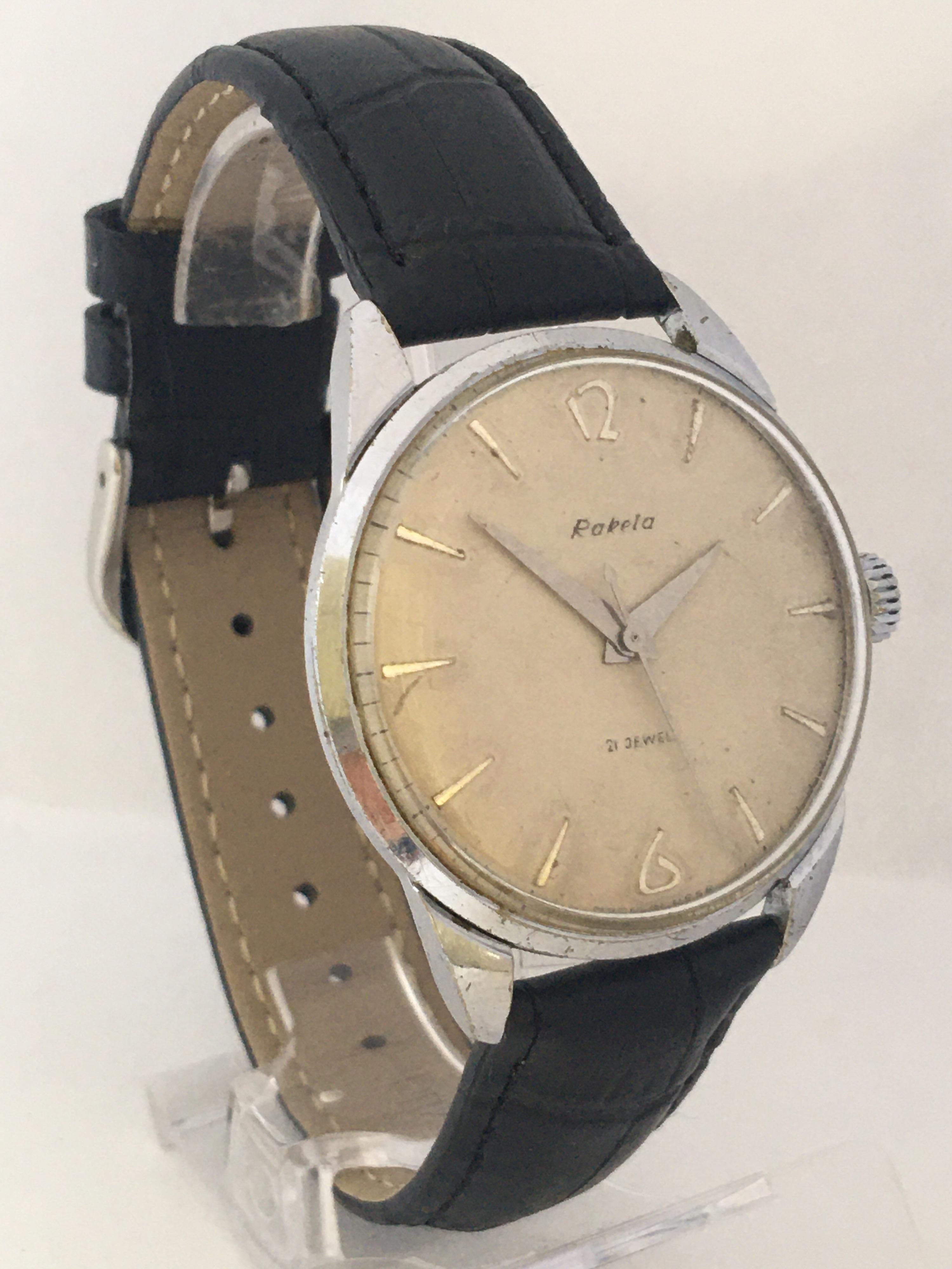 This Classic hand winding watch is in perfect working condition! The mechanical movement is in a fully working order, runs and keeps very good time. Visible signs of ageing and wear with small light scratches and  a tarnishes on the white metal case
