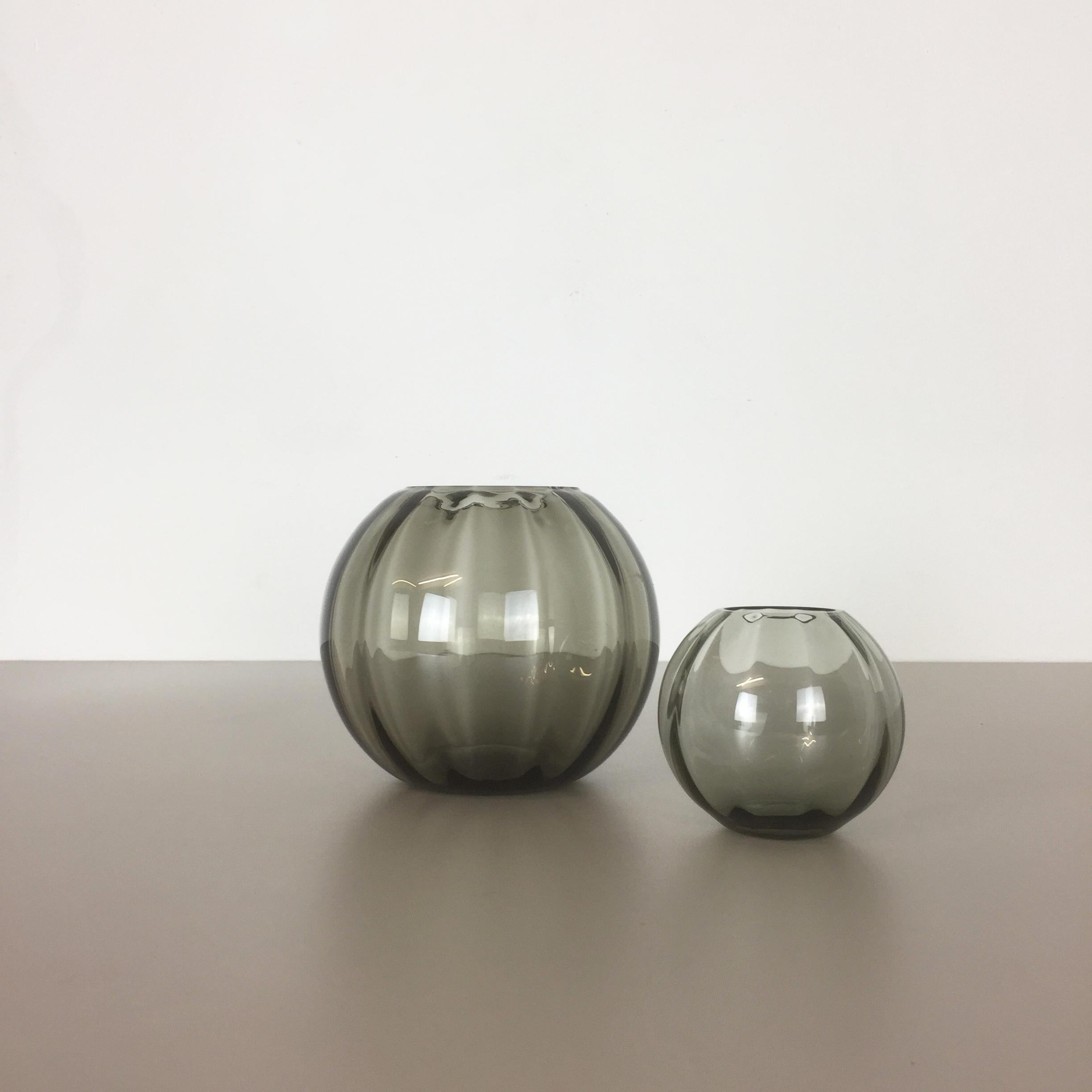 Article:

Set of 2 Turmalin Vases


Producer:

WMF, Germany


Design:

Prof. Wilhelm Wagenfeld BAUHAUS



Decade:

1960s


Description:

Original vintage 1960s Set of 2 Vases of the Wagenfeld Turmalin series. These two vase