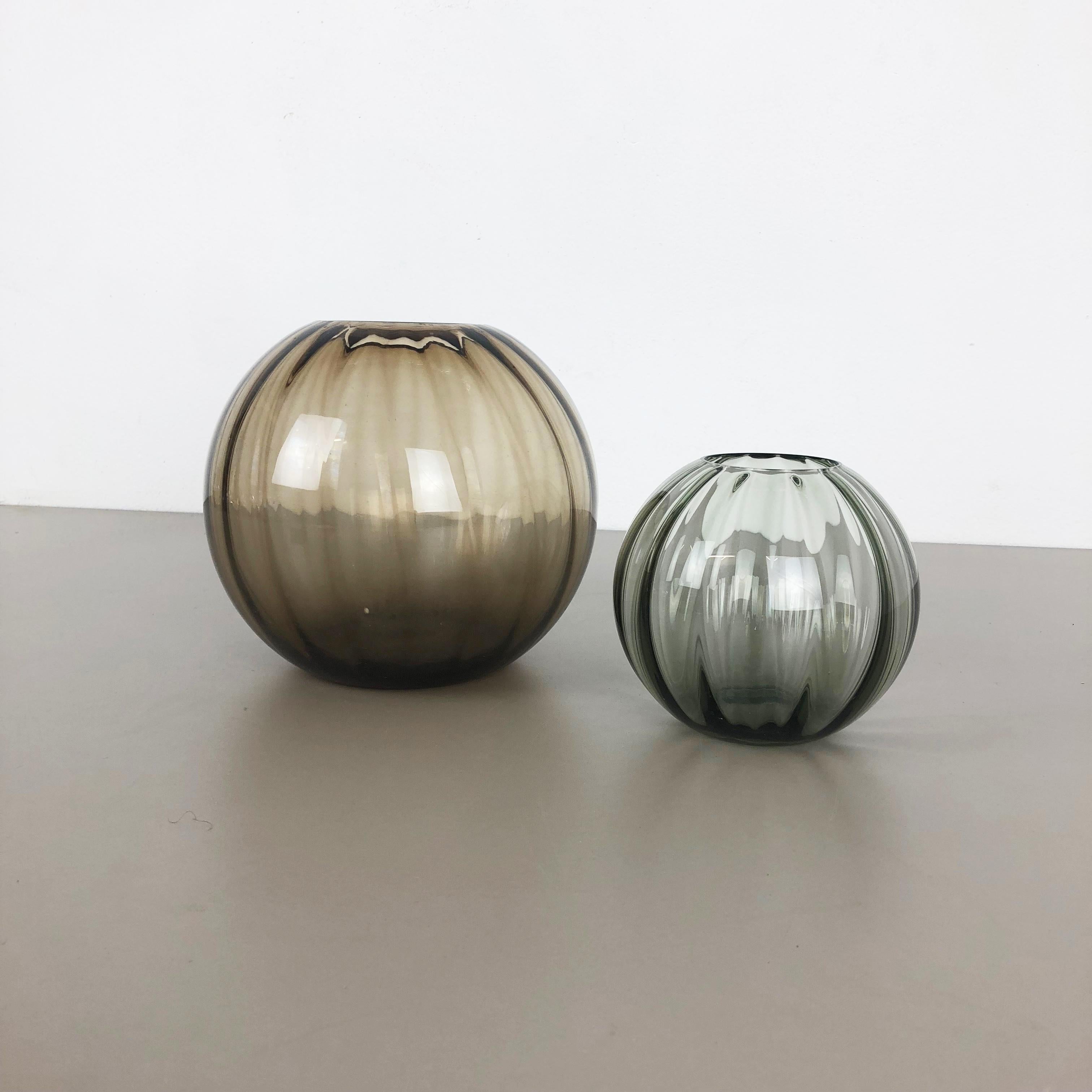 Article:

Set of two Turmalin Vases


Producer:

WMF, Germany


Design:

Prof. Wilhelm Wagenfeld BAUHAUS



Decade:

1960s




original vintage 1960s set of 2 Vases of the Wagenfeld Turmalin series. these two vase are designed
