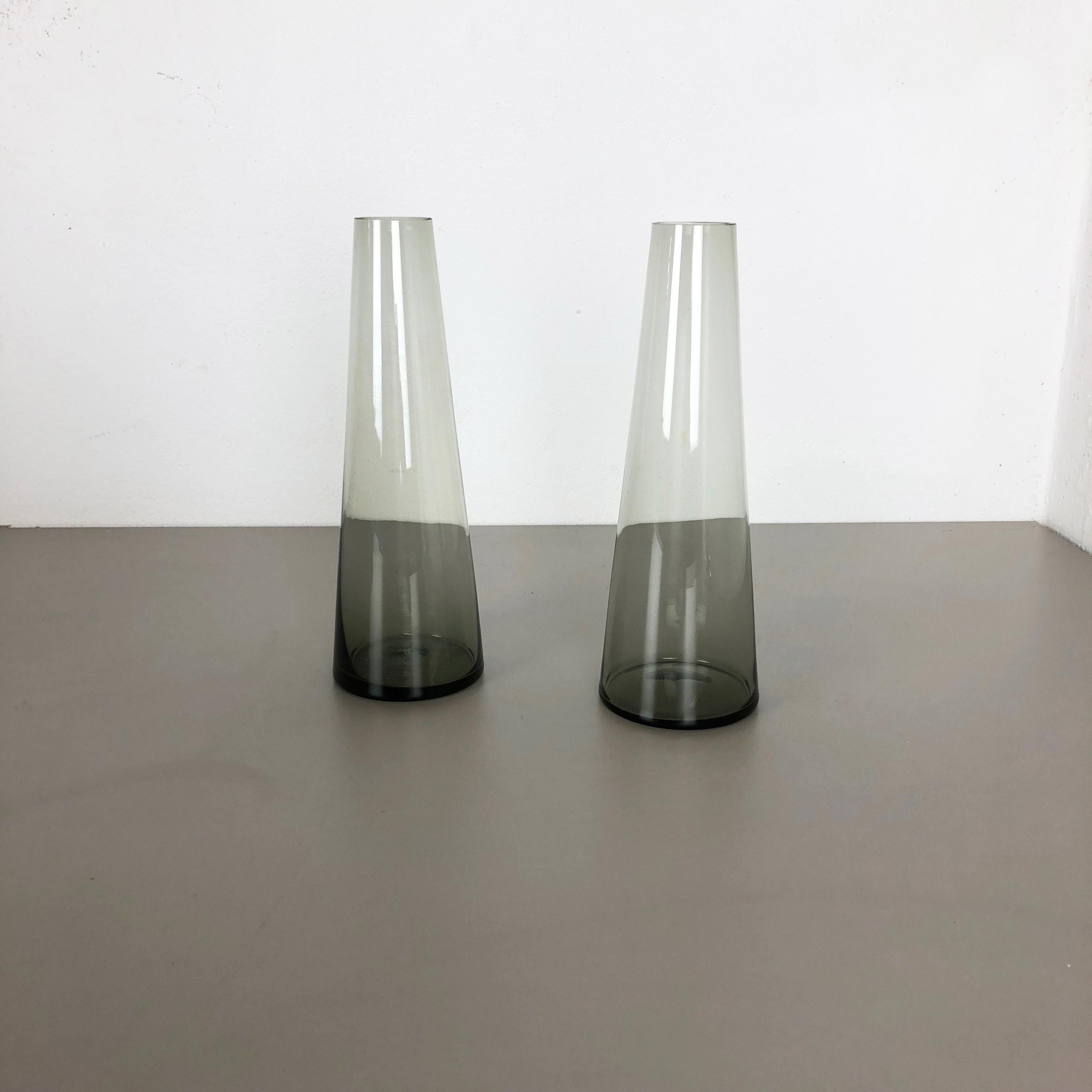 Article:

Set of 2 Turmalin vases


Producer:

WMF, Germany


Design:

Prof. Wilhelm Wagenfeld Bauhaus 



Decade:

1960s


Description:

Original vintage 1960s set of 2 vases of the Wagenfeld Turmalin series. These two vase