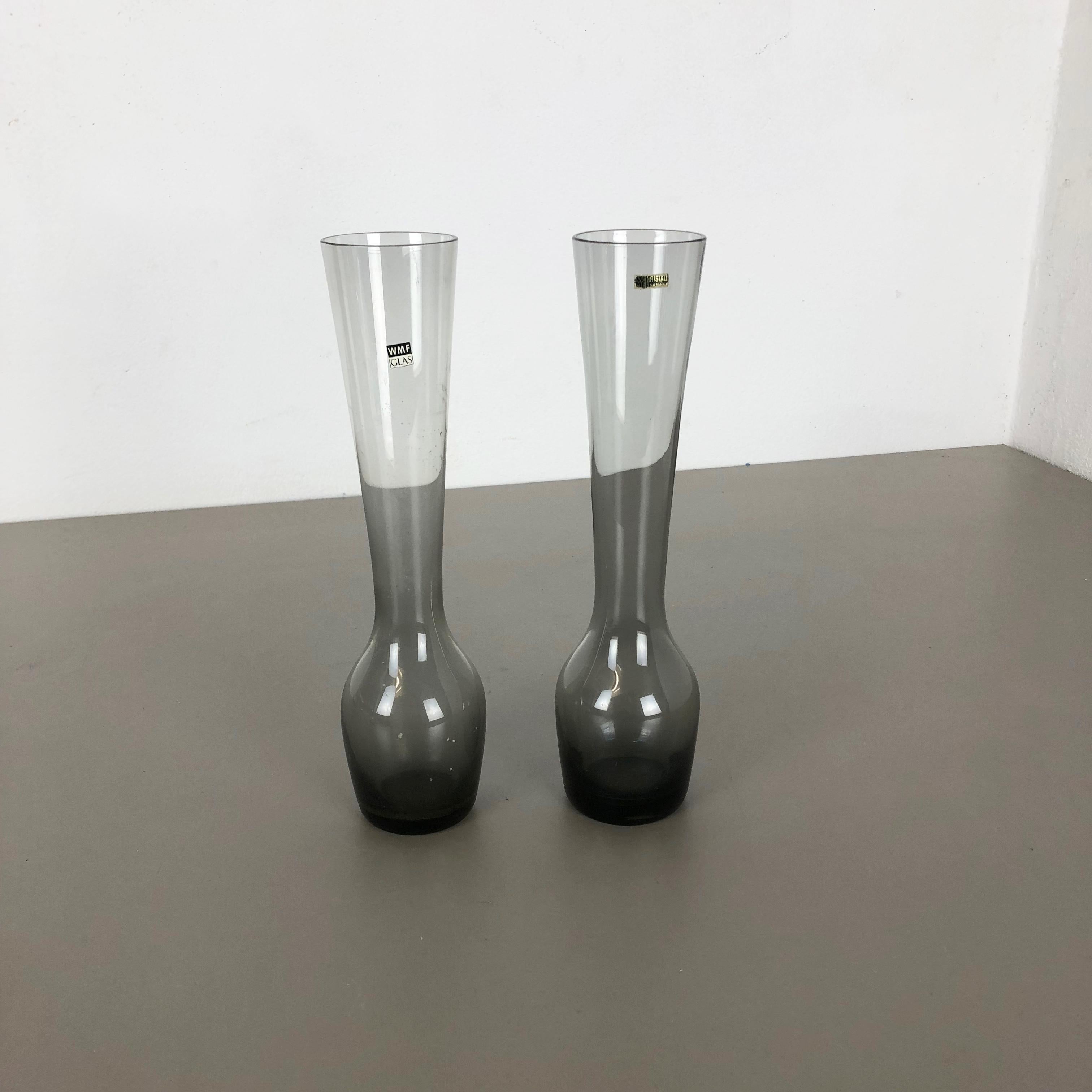 Article:

Set of 2 Turmalin vases


Producer:

WMF, Germany


Design:

Prof. Wilhelm Wagenfeld Bauhaus 



Decade:

1960s




Original vintage 1960s set of 2 vases of the Wagenfeld Turmalin series. These two vase are designed