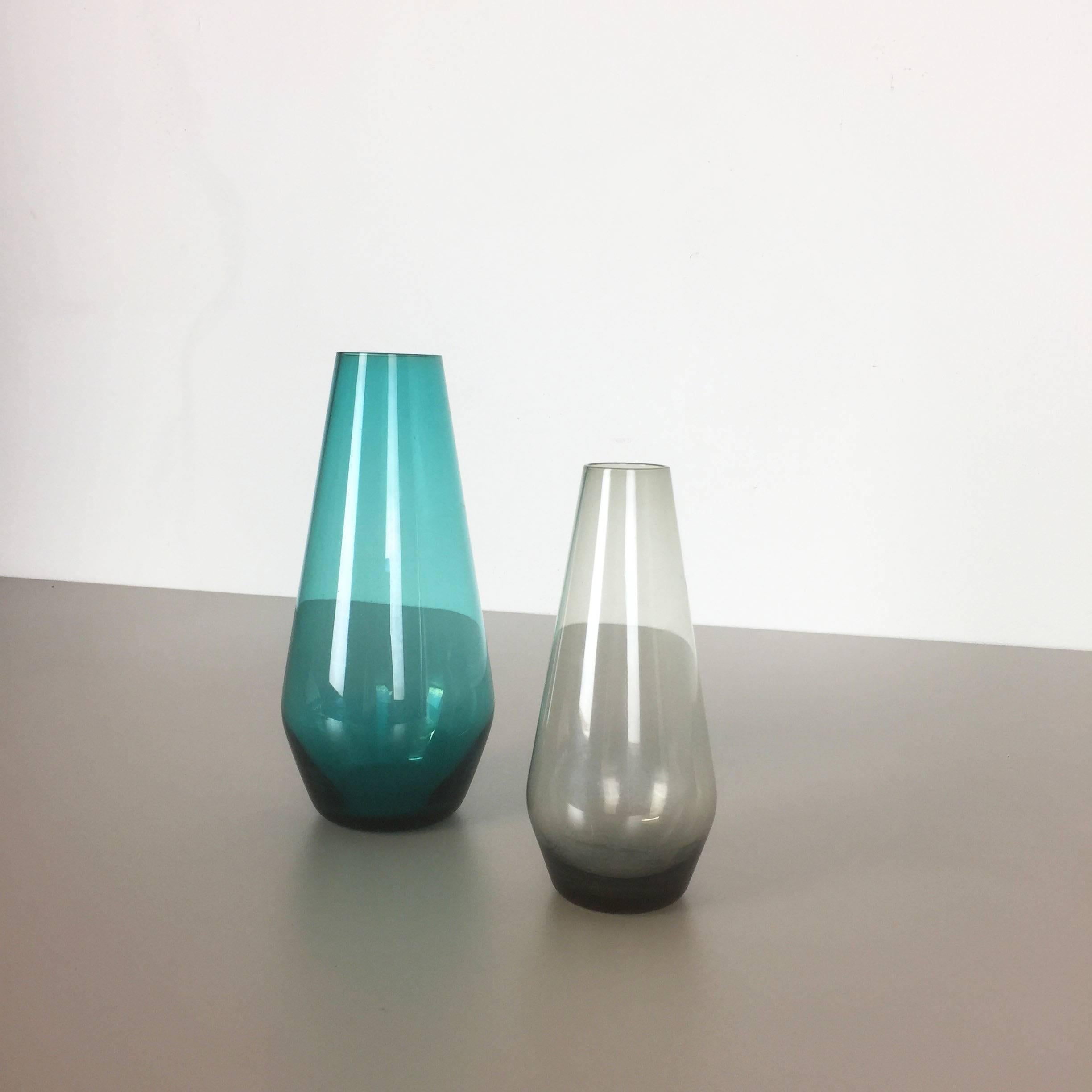 Article:

Set of two Turmalin vases


Producer:

WMF, Germany


Design:

Prof. Wilhelm Wagenfeld Bauhaus 



Decade:

1960s


Description:

Original vintage 1960s set of two vases of the Wagenfeld Turmalin series. These two