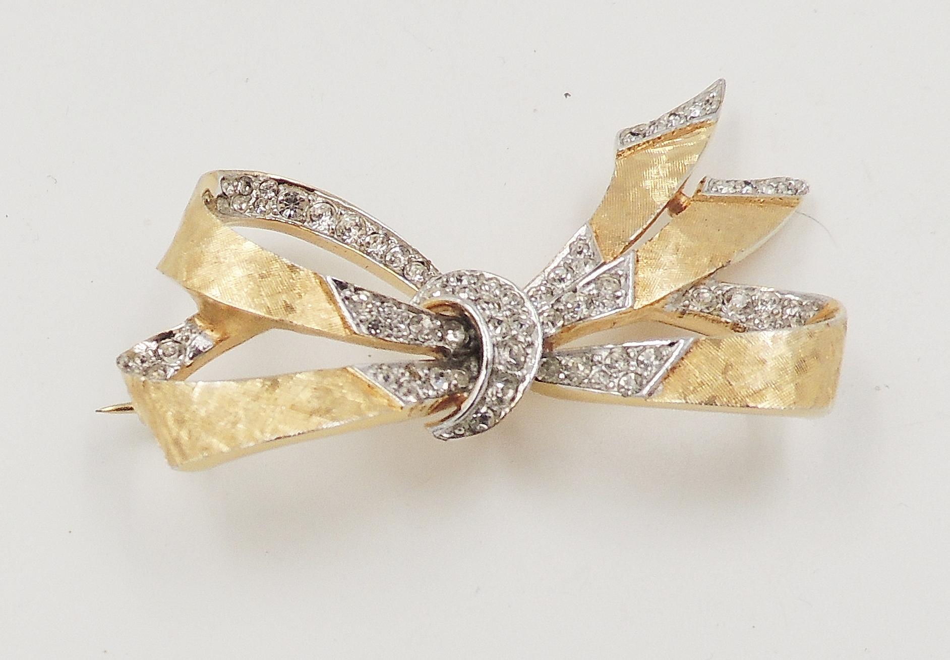 Vintage 1960s Signed Boucher Goldtone & Pave Rhinestone Bow Brooch In Excellent Condition For Sale In Easton, PA