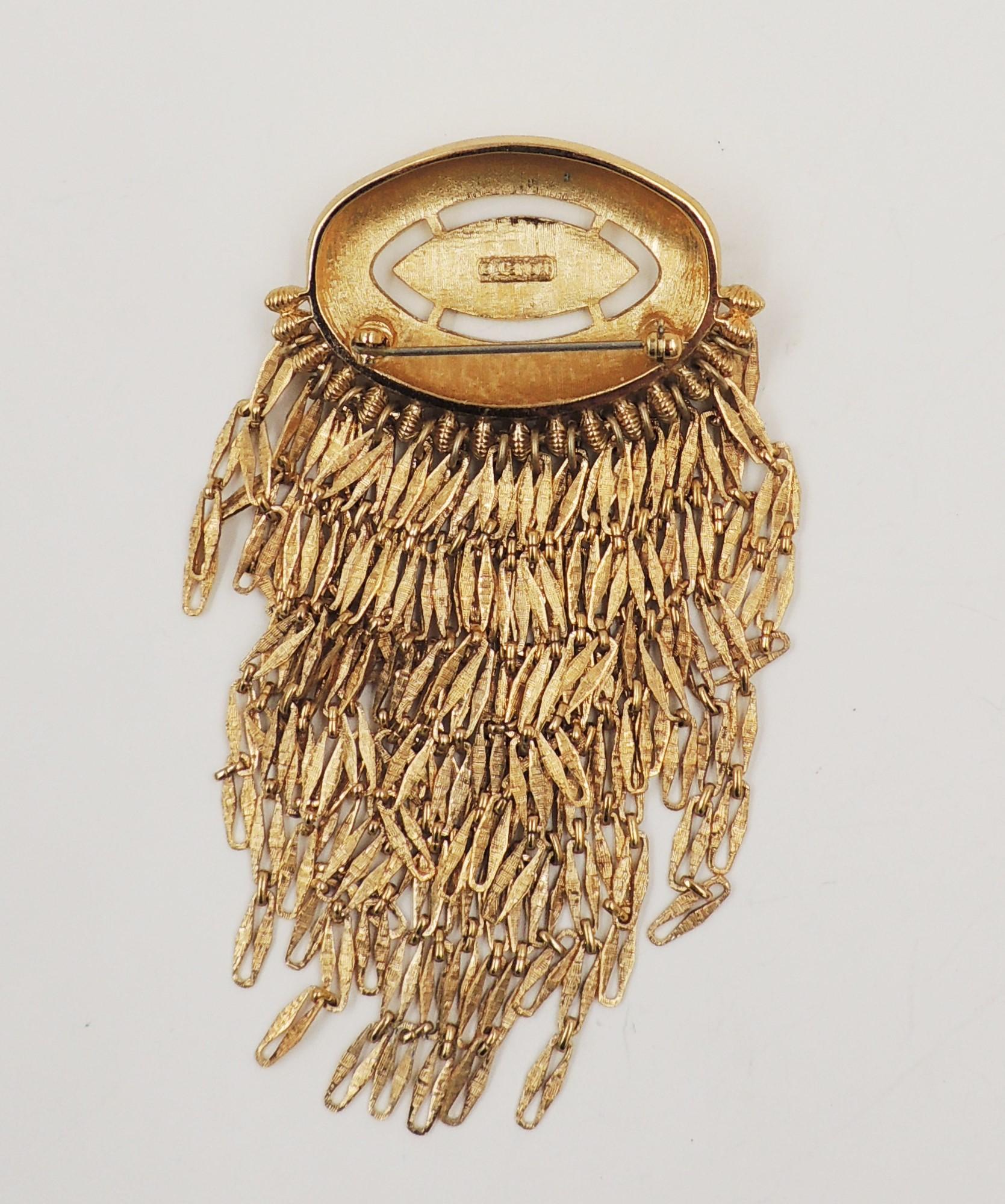 1960s goldtone Florentine finish top with fringe bottom brooch with security clasp. Marked 