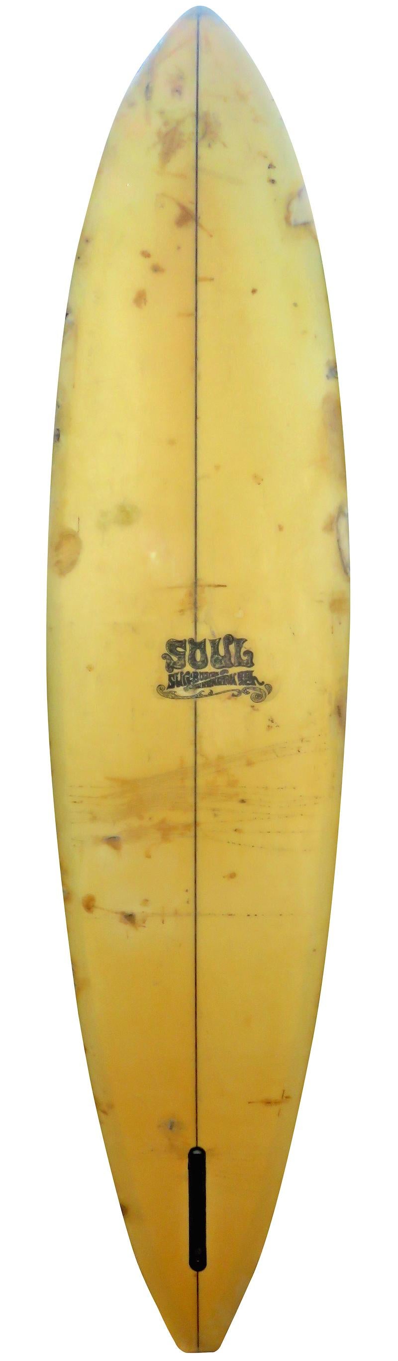 Soul surfboards single fin surfboard. Shaped in 1969 during the transitional period of surfboard history, when surfboards were just beginning to be shaped shorter in length. Made under the Soul Surfboards label out of Huntington Beach, California.
