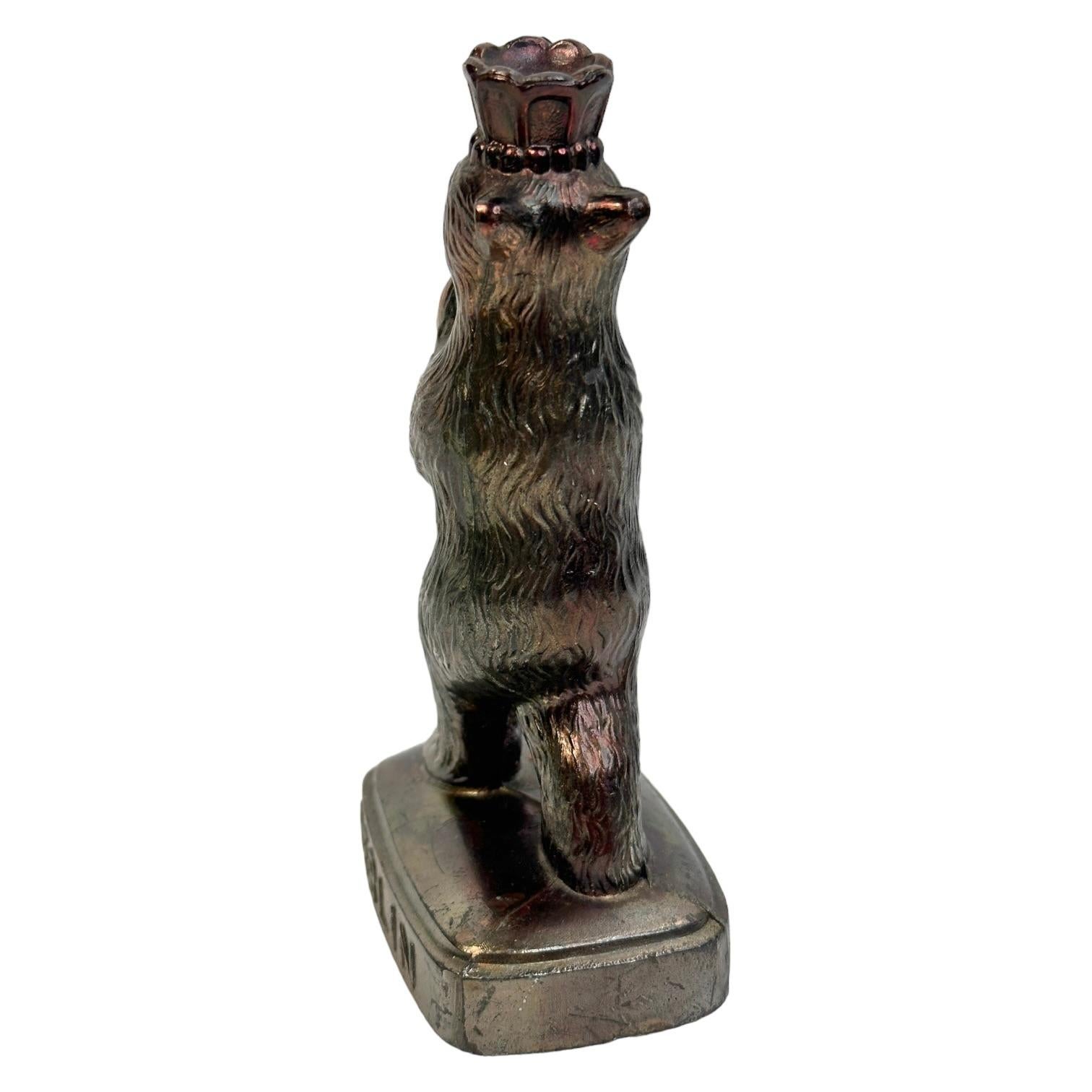 A classic decorative Berlin bear statue. Some wear with a nice patina, but this is old-age. Made of metal. This item was bought as a souvenir in Berlin and was made in the mid-20th century probably to the end of 1960s.