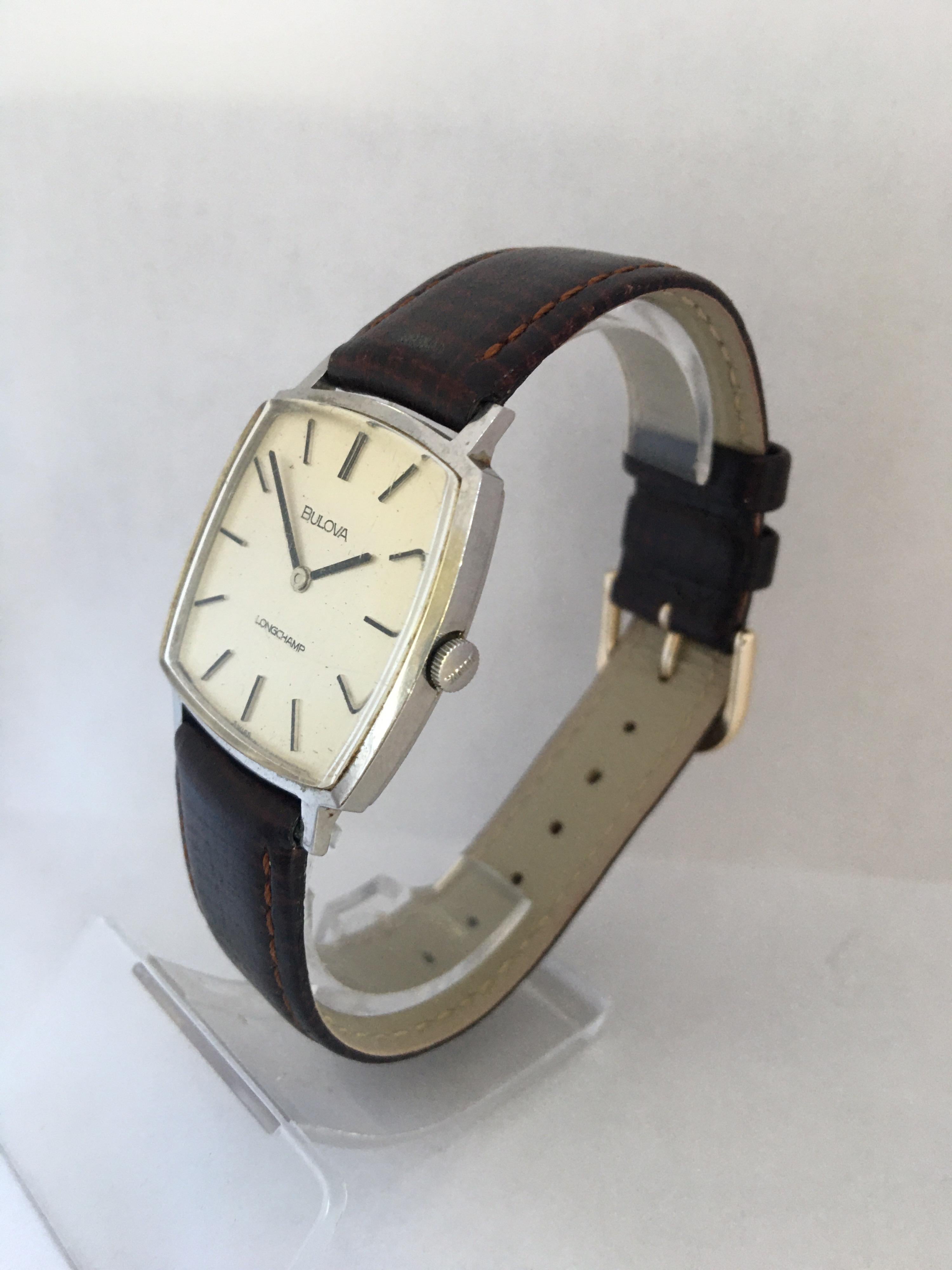 This beautiful classic hand winding watch is in good working condition and it is running well. Visible signs of ageing and wear. The strap buckle is gold plated as shown. Watch dimensions are 31mm wide and 39mm long. 

Please study the images