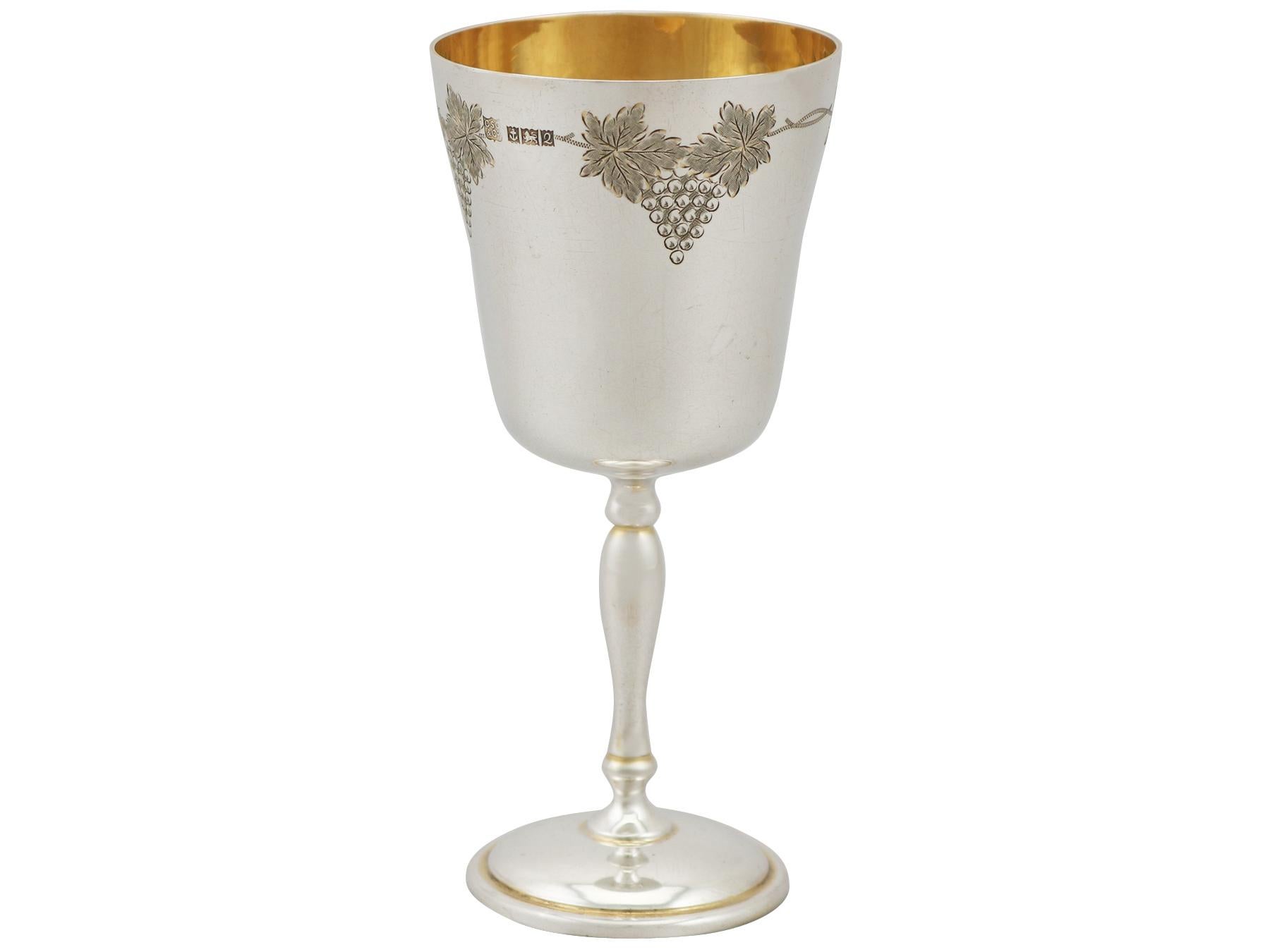 A fine and impressive vintage Elizabeth II sterling silver goblet; an addition to our wine and drinks related silverware collection.

This fine vintage English sterling silver goblet has a plain bell shaped form onto a cylindrical baluster shaped