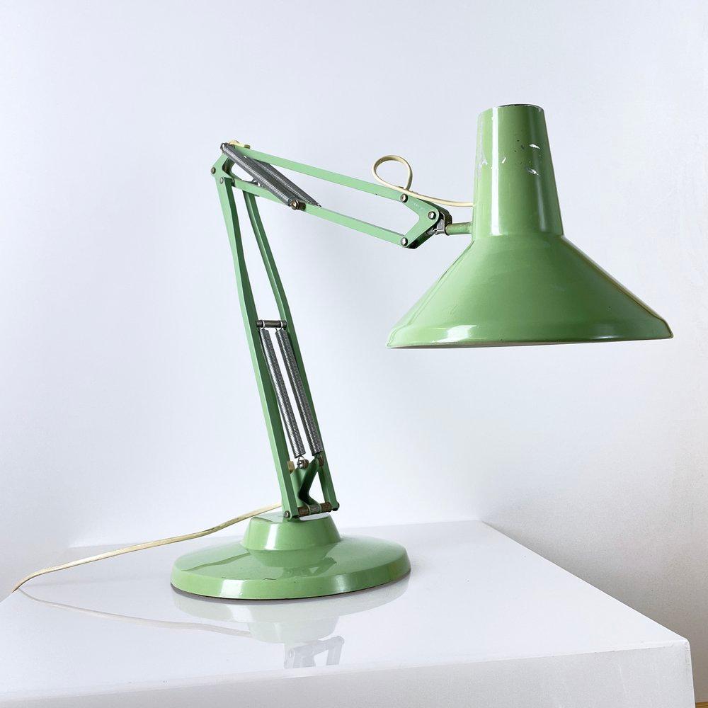 Vintage 1960’s Suspension Architects Lamp with tilting shade.  U.S. Patent No. 2787434. Regent, Switzerland 
Produced: Regent, CH
Max 100W
Measurements: Height: ca. 70 cm  Shade (diameter): 21.5cm
Colour: Pastel Green
Condition: Very good with