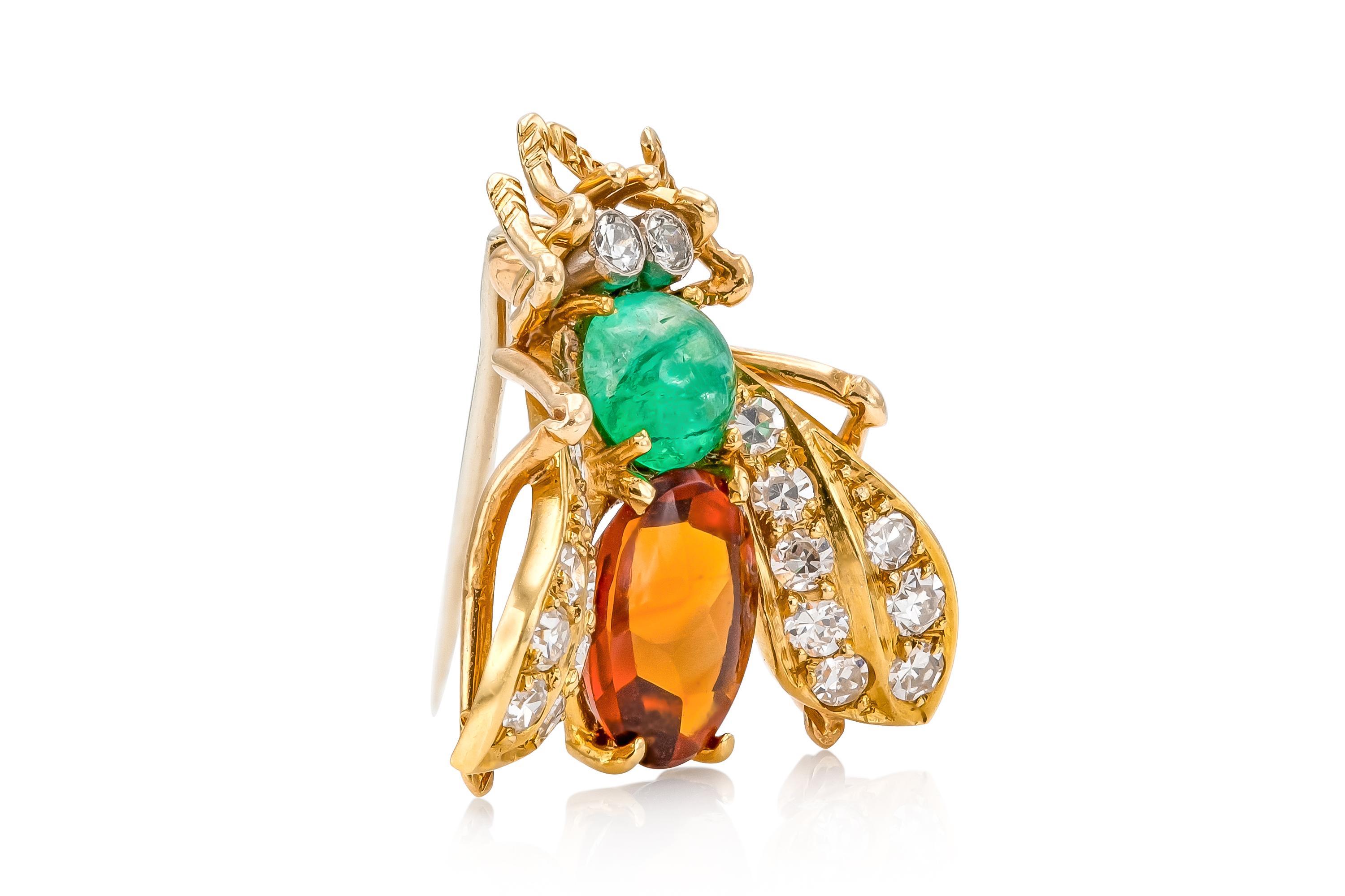 Finement réalisé en or jaune 18k avec des diamants ronds de taille brillant, une émeraude cabochon et une citrine cabochon.
Signé par Van Cleef & Arpels
Circa 1960s
1 x 7/8 pouces