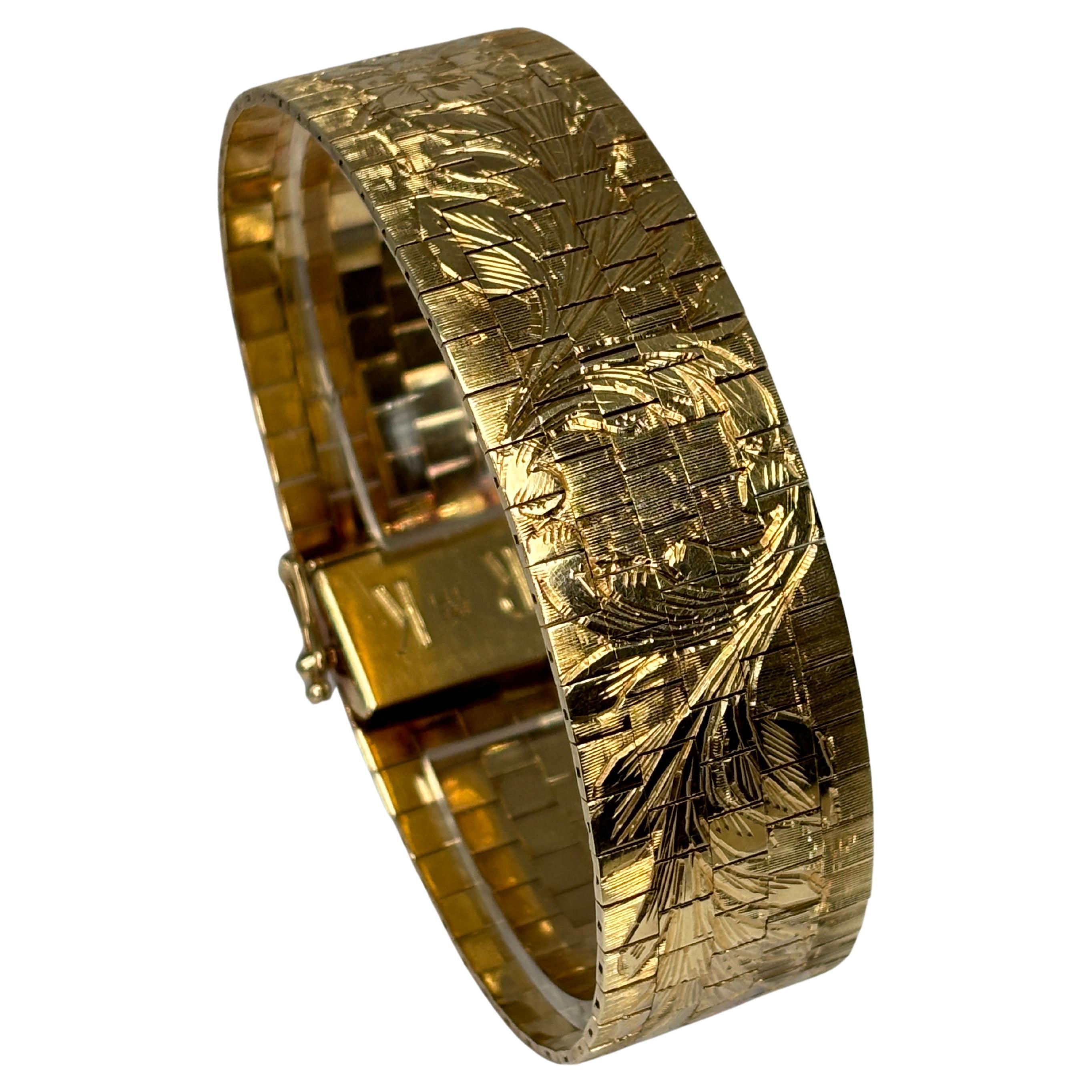 Bracciale vintage anni '60 in oro giallo 14k, largo e pesante, con disegno di fiori inciso