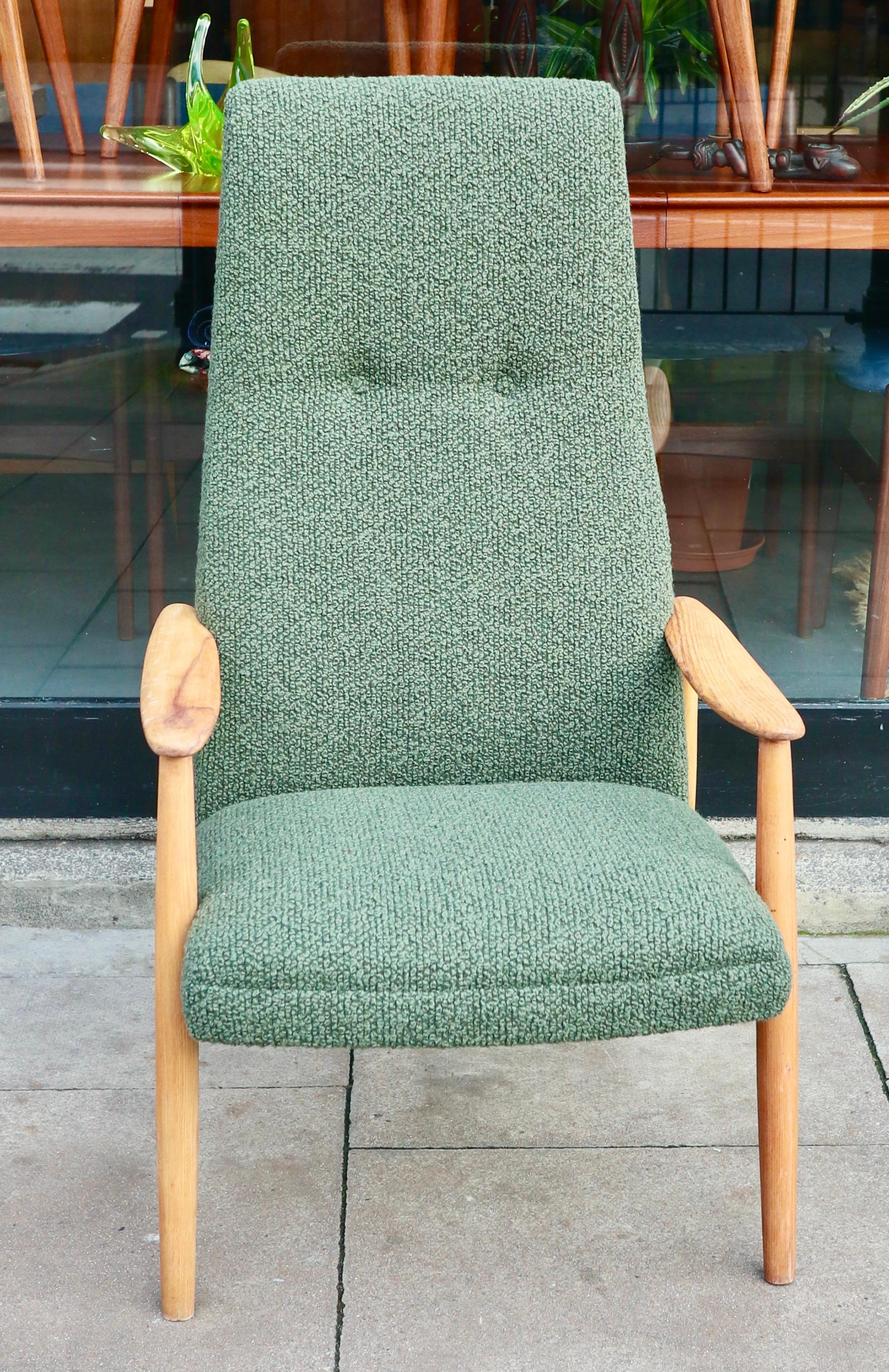 Mid-Century Modern Vintage 1960s wood framed Danish lounge chair upholstered in moss green boucle. For Sale