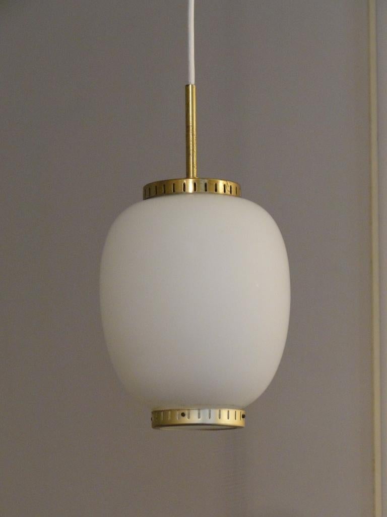 Bent Karlby. China lamp in white opal glass, brass mounting, frosted glass blind shade. 1960s. 
Produced by Lyfa. Good used condition.
E27 Bulb rewired and functional 