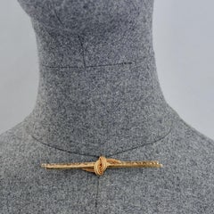 Spilla vintage del 1961 GROSSE con catena a doppio anello annodata