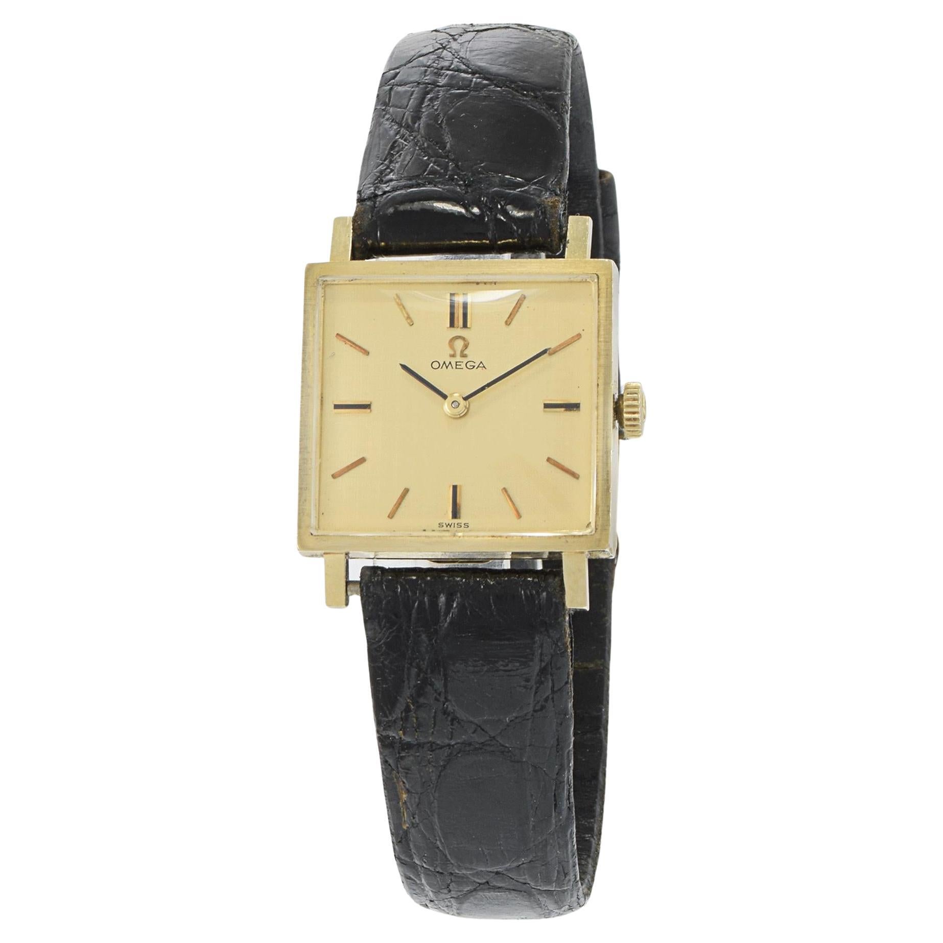 Vintage 1963 Orologio Omega in oro giallo 14KT in vendita