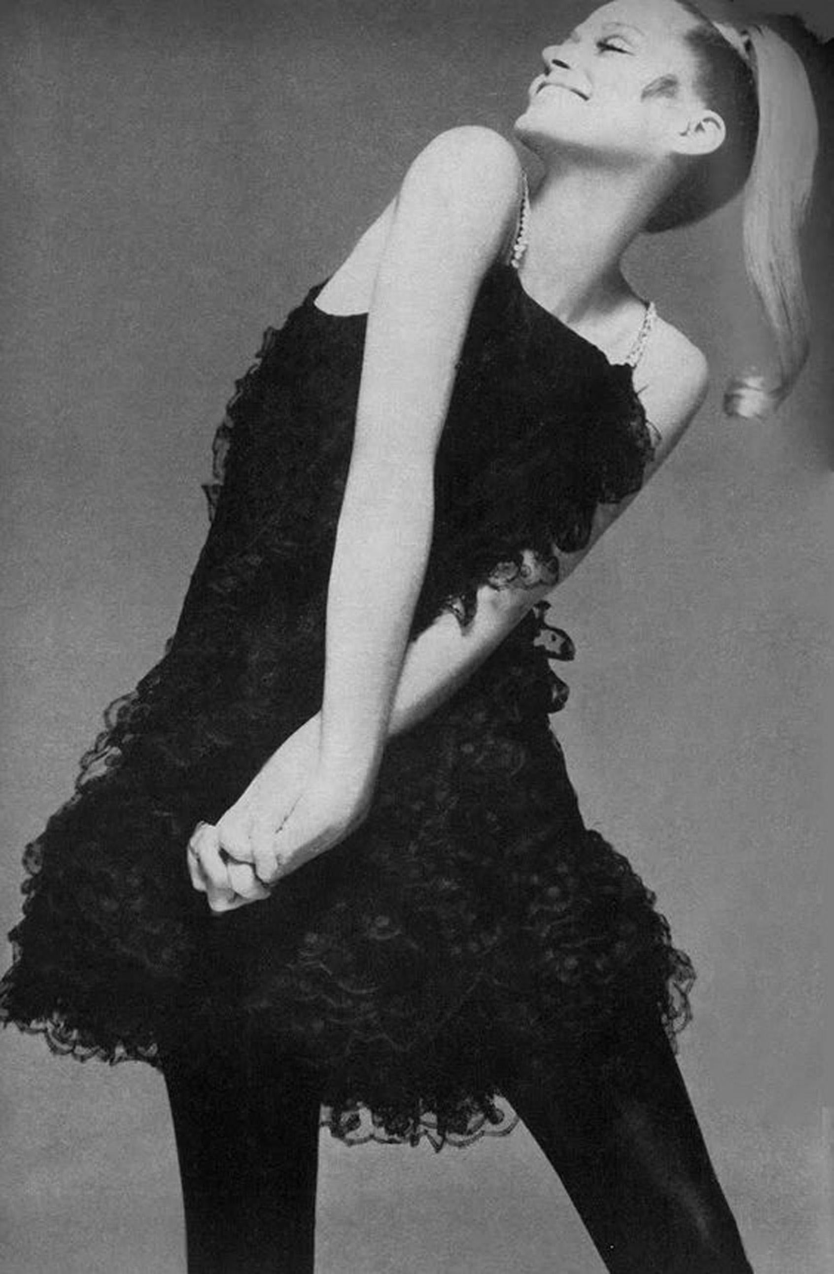 An important and well-documented Galanos black polka-dot net lace cocktail dress dating back to fall-winter 1967. As shown, the beautiful Lauren Hutton graced the pages of Vogue wearing this mod showstopper. Dedication to excellence in craftsmanship