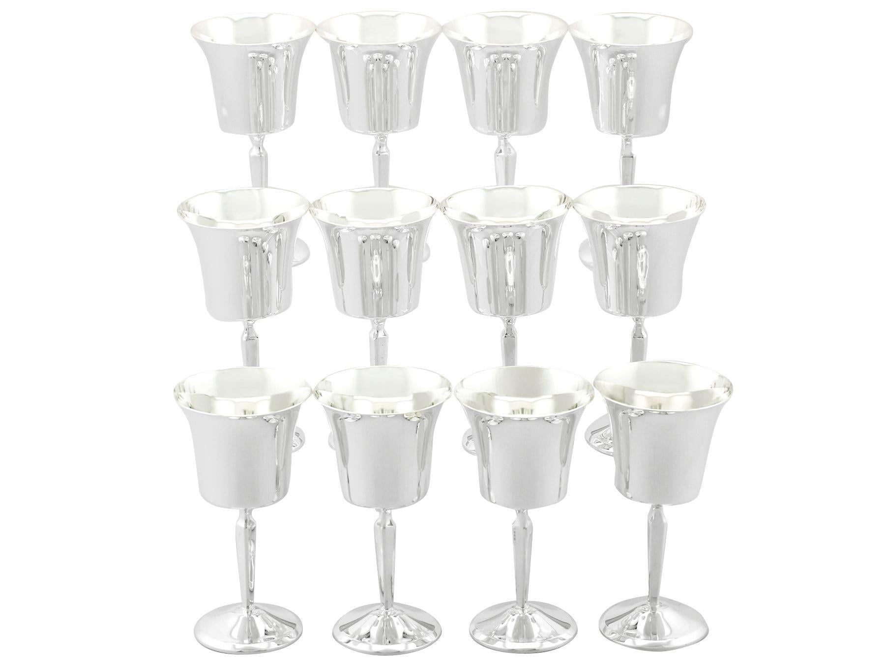 An exceptional, fine and impressive vintage Elizabeth II English sterling silver goblets; an addition to our range of wine and drink related silverware.

These exceptional vintage sterling silver goblets have a flared bell shaped form supported by a