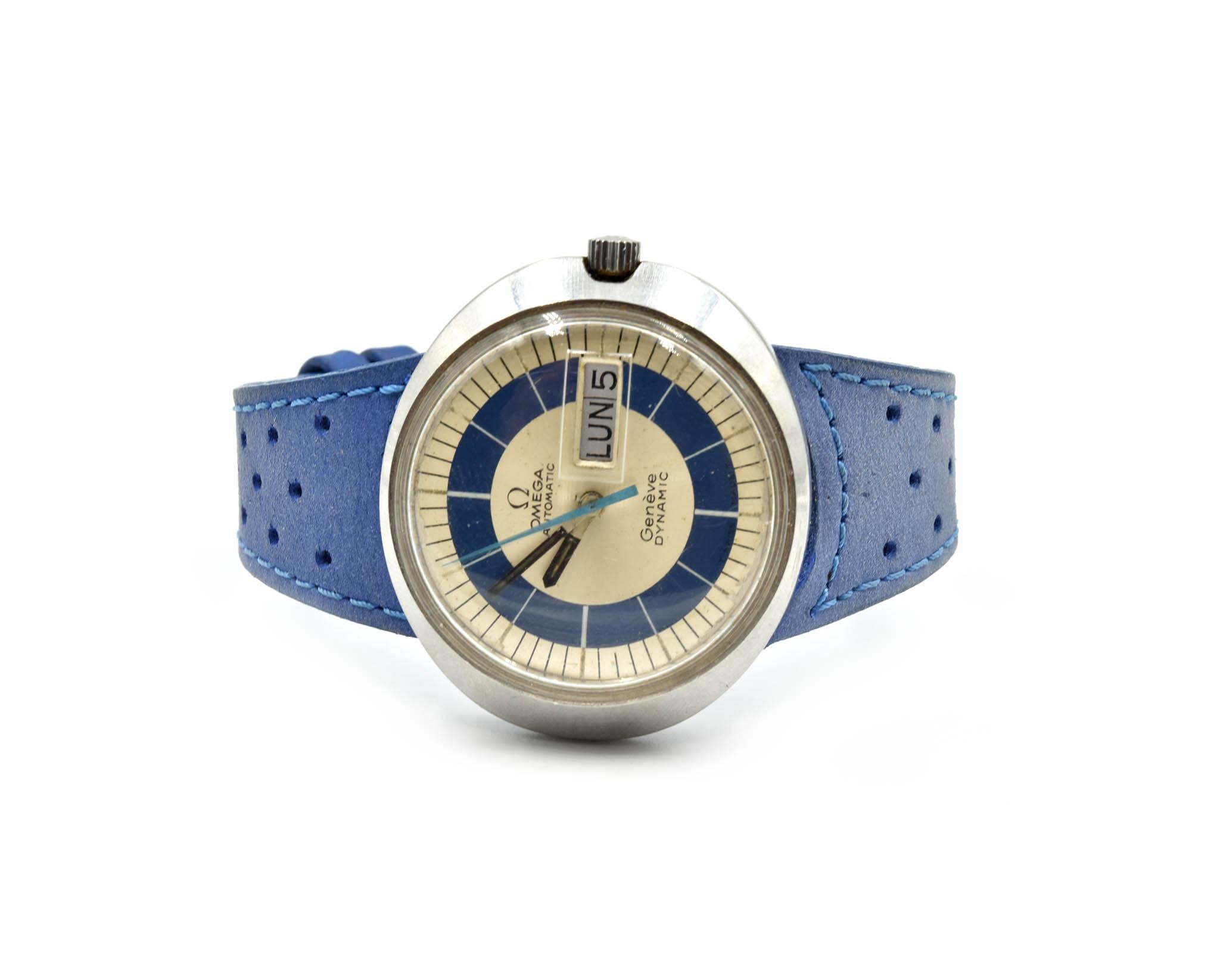 Movement: manual wind
Function: hours, minutes, seconds, day, date
Case: oval 41mm x 36mm stainless steel case, stainless steel domed bezel, plastic crystal, stainless steel winding crown, solid case back
Band: blue strap with stainless steel tang