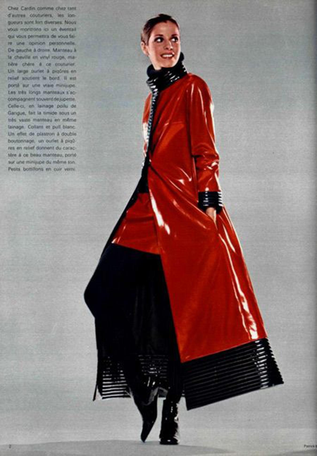 An absolutely iconic and well-documented Pierre Cardin red and black vinyl maxi length mod coat dating back to his epic 1969-70 fall/winter collection. As shown, this archival piece had a full page editorial in L'Officiel magazine and is part of